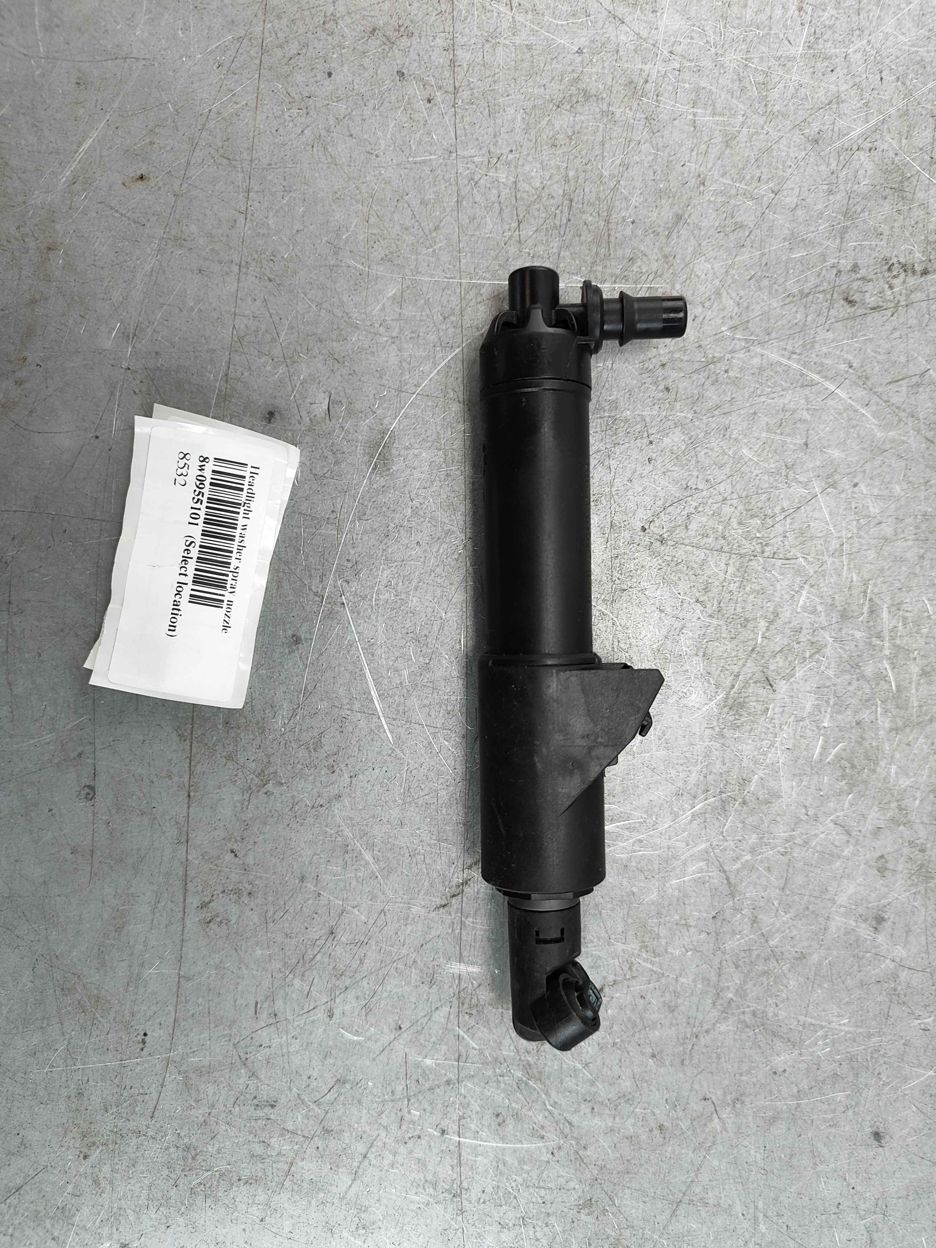 Headlight washer spray nozzle