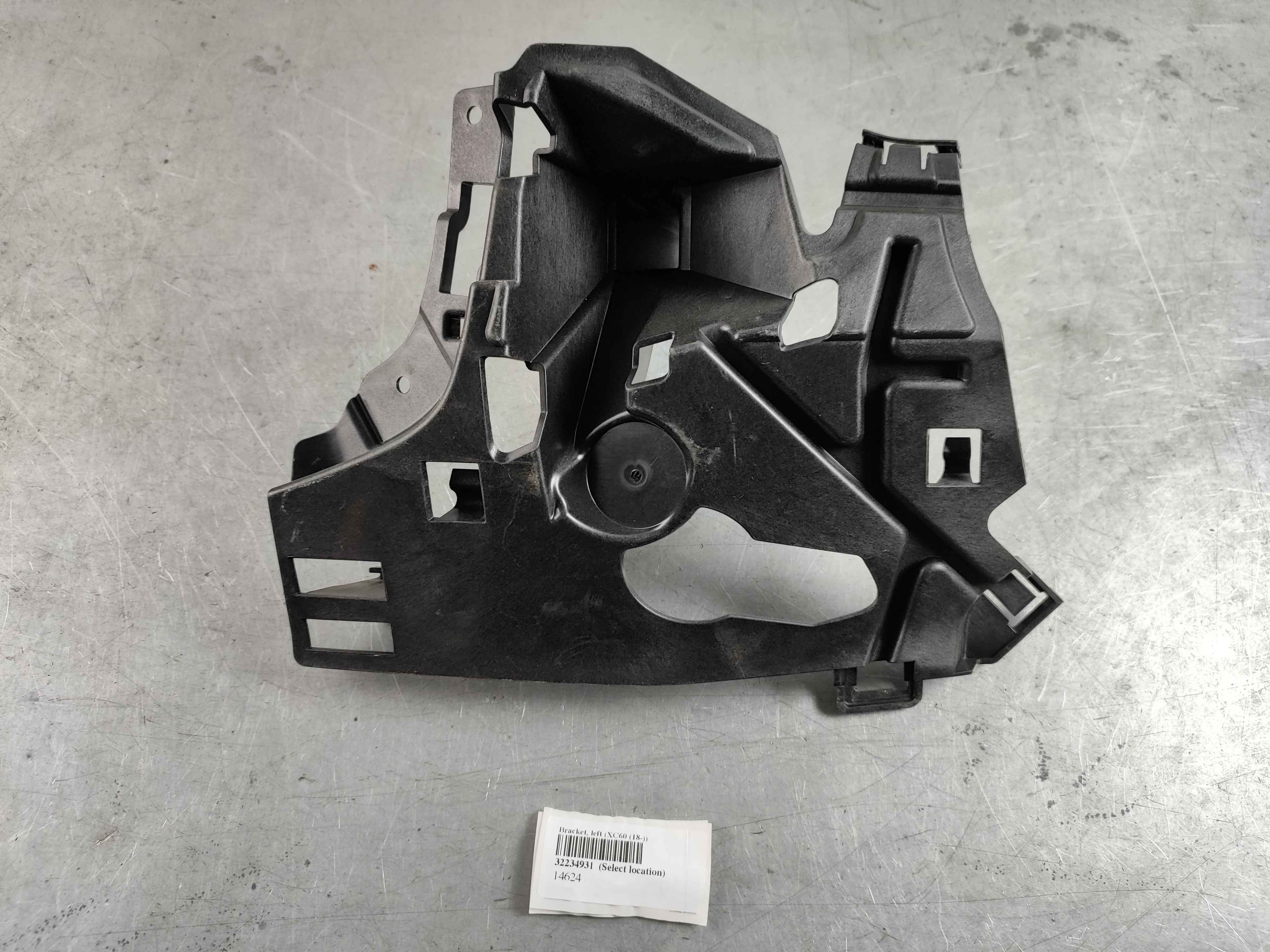 Bracket, left (XC60 (18-))