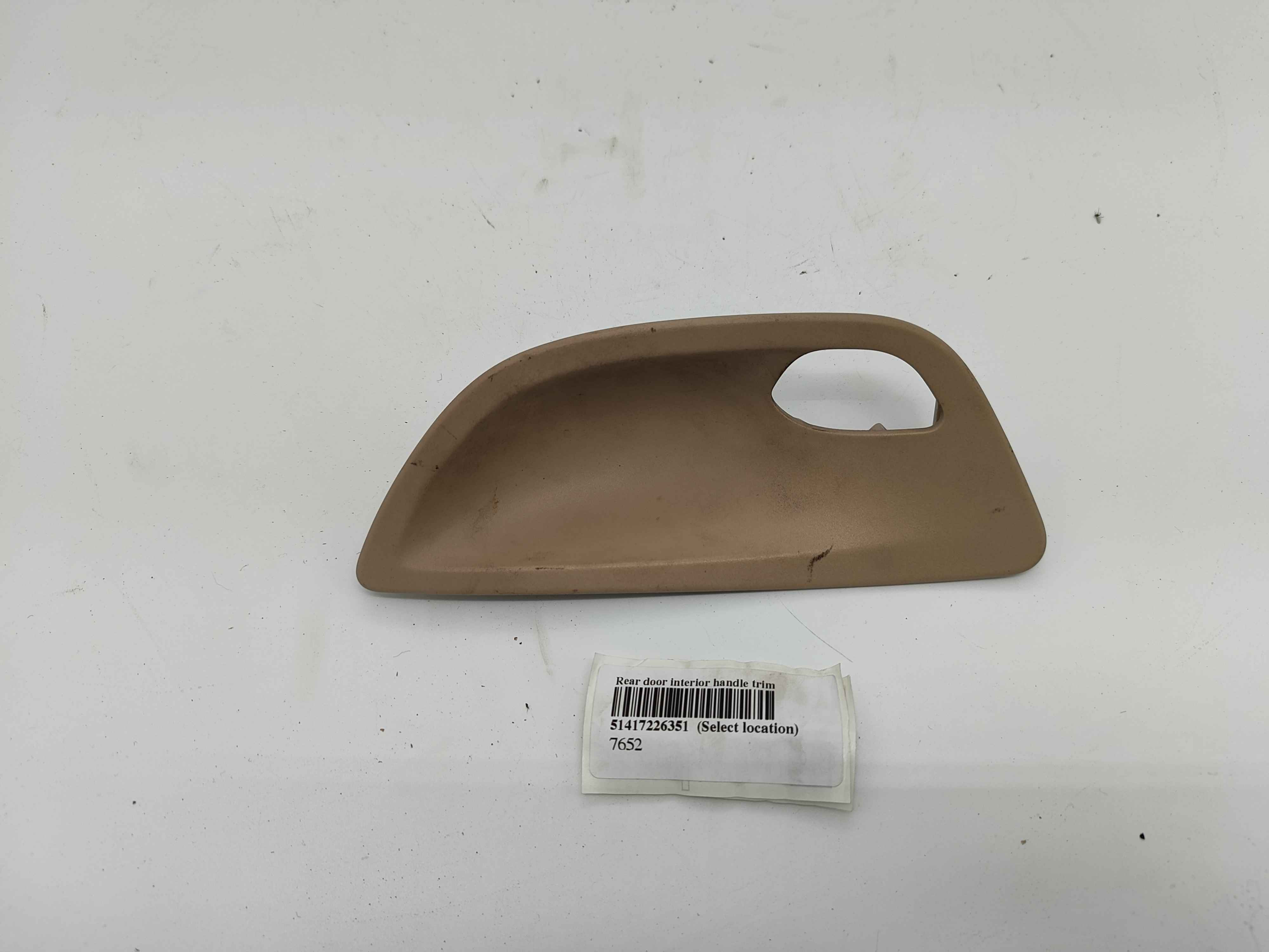 Rear door interior handle trim