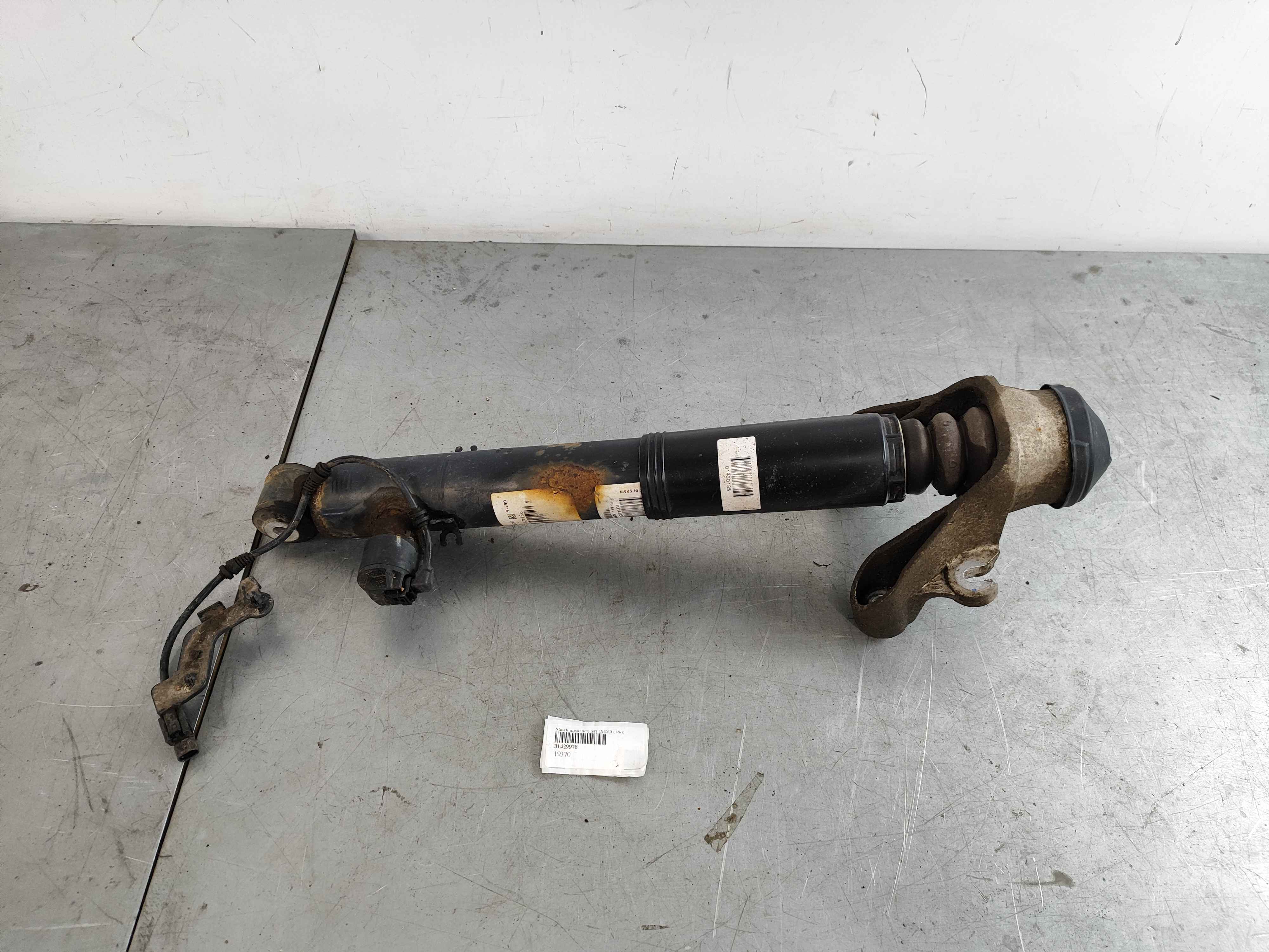 Shock absorber, left (XC60 (18-))