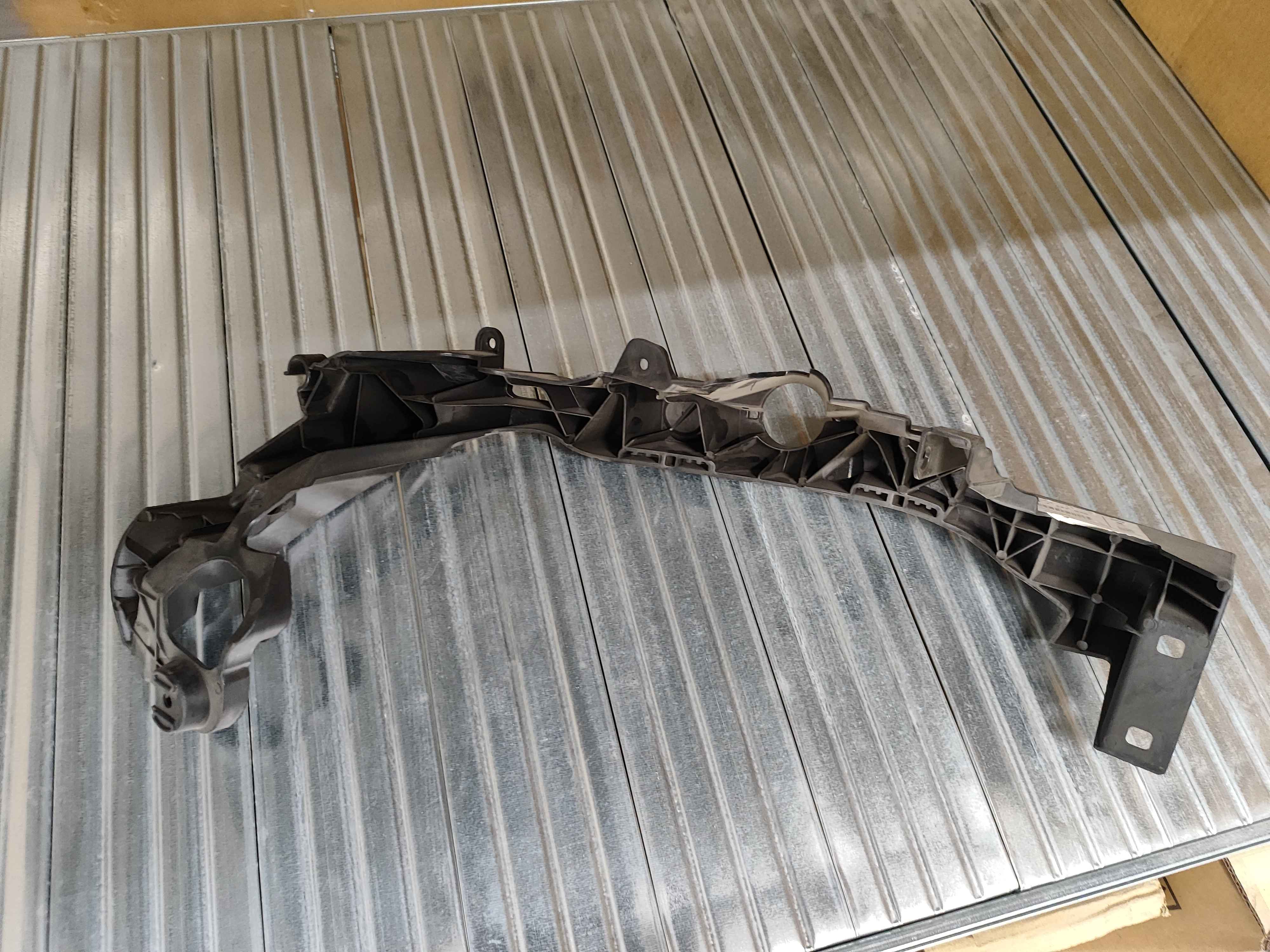 Headlight arm, right BMW