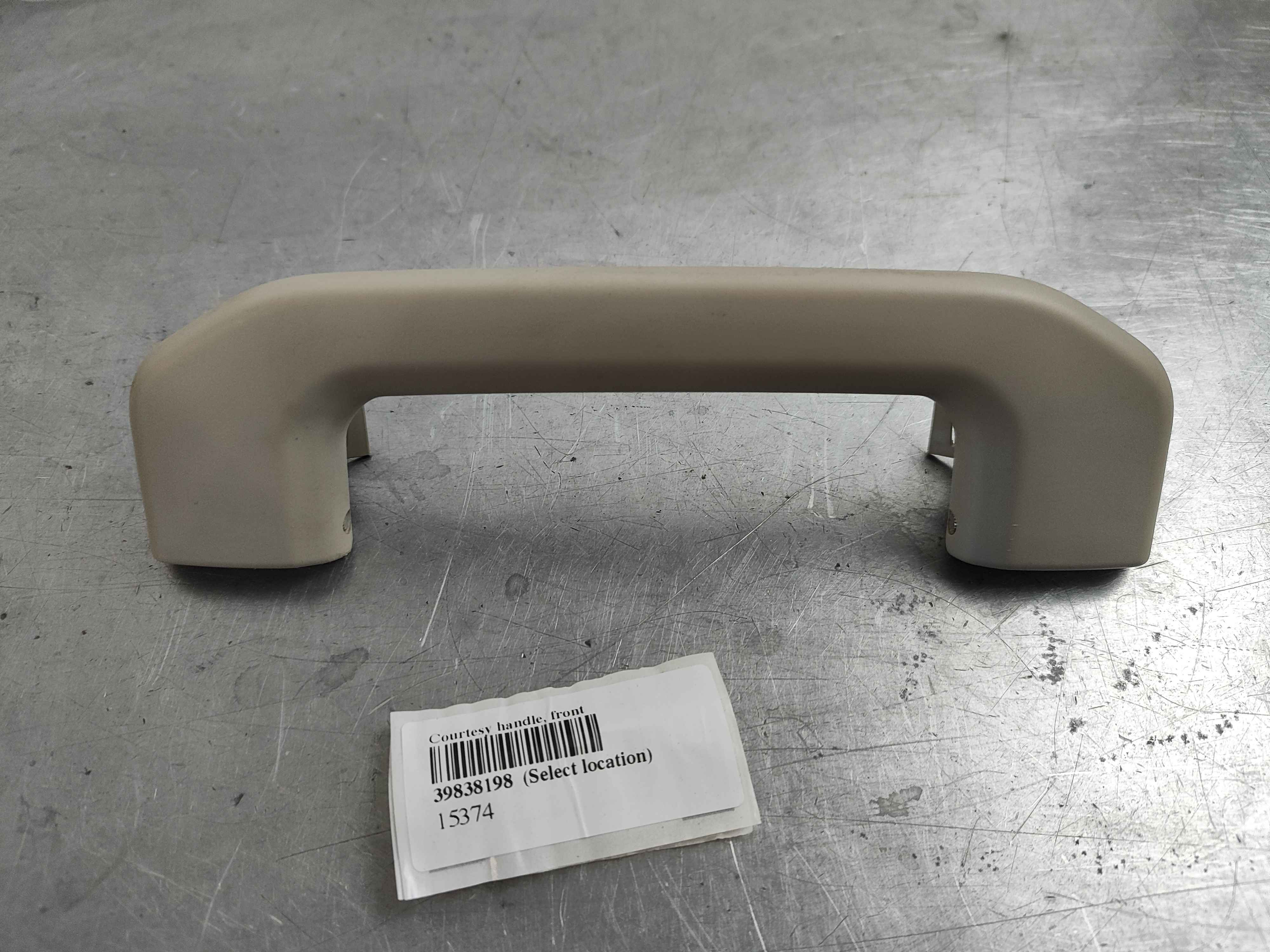 Courtesy handle, front