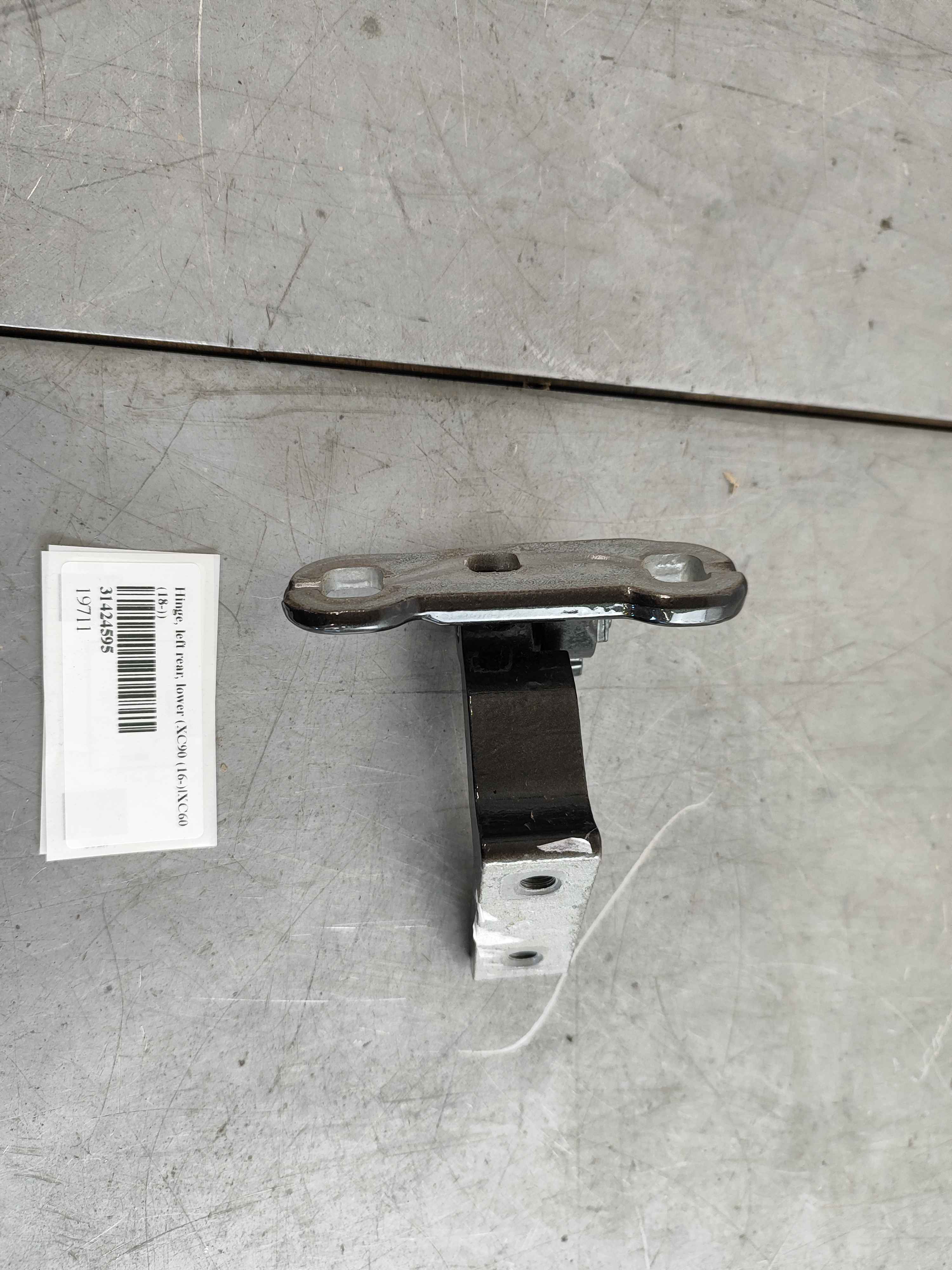 Hinge, left rear, lower (XC90 (16-)|XC60 (18-))