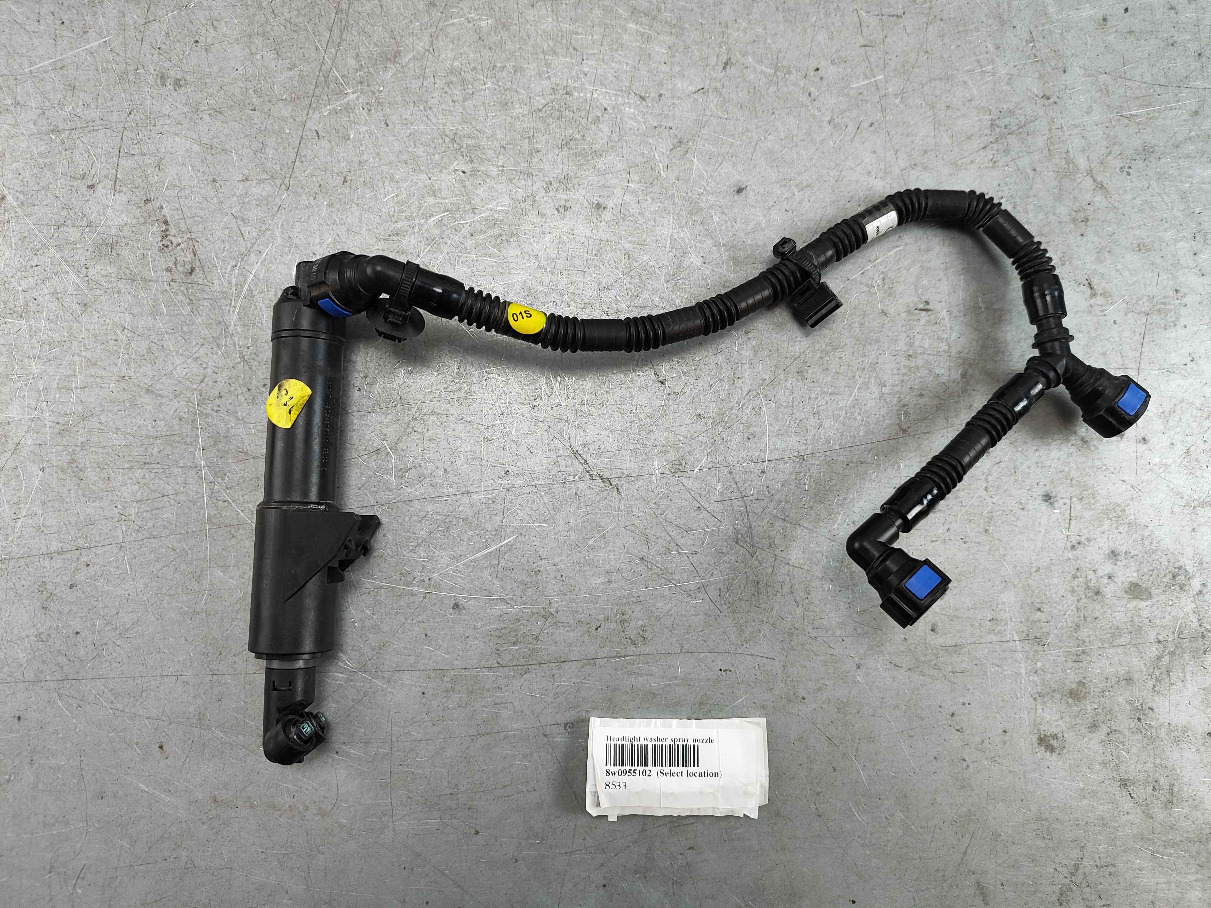 Headlight washer spray nozzle