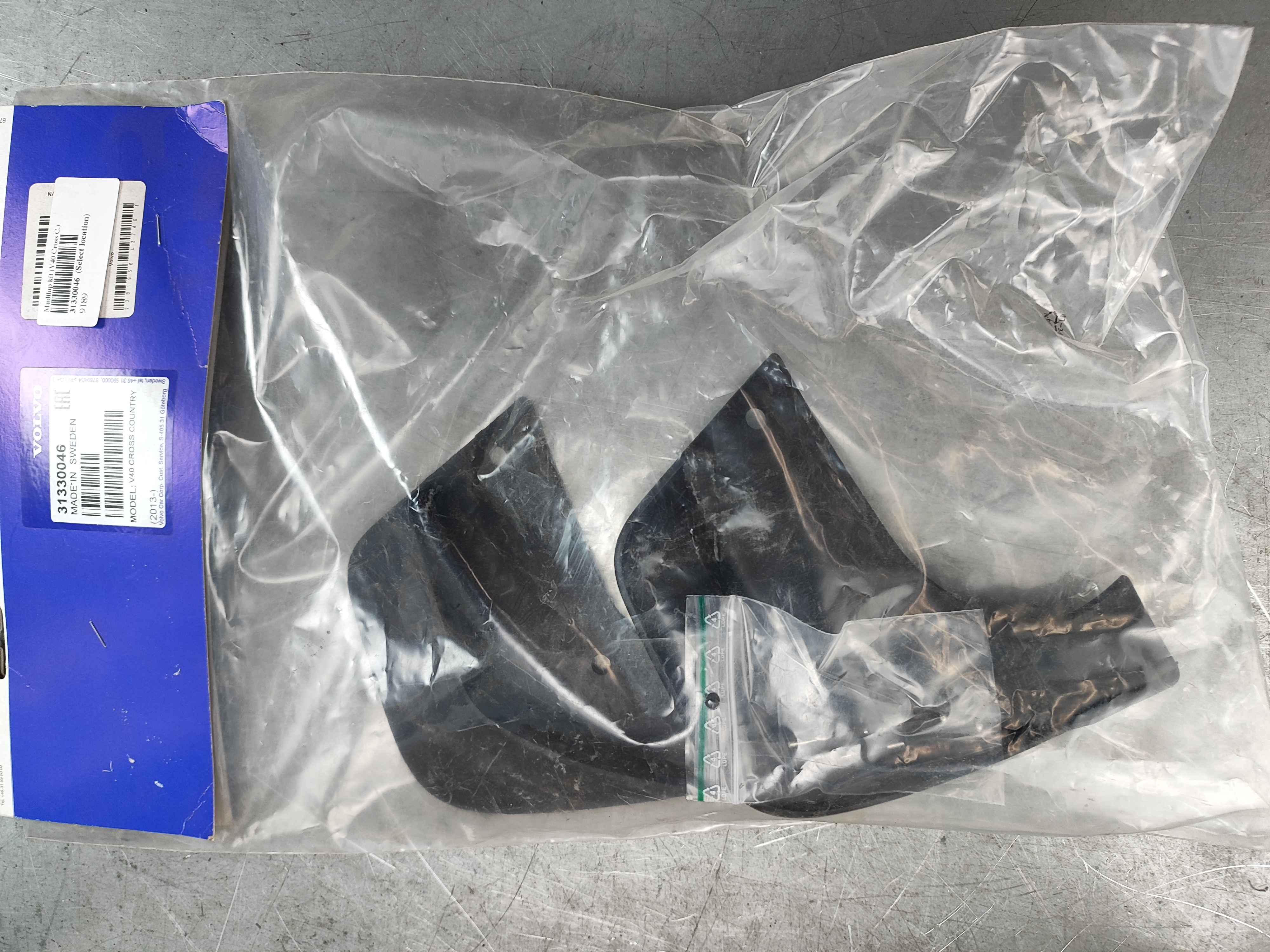 Mudflap kit (V40 Cross C.)