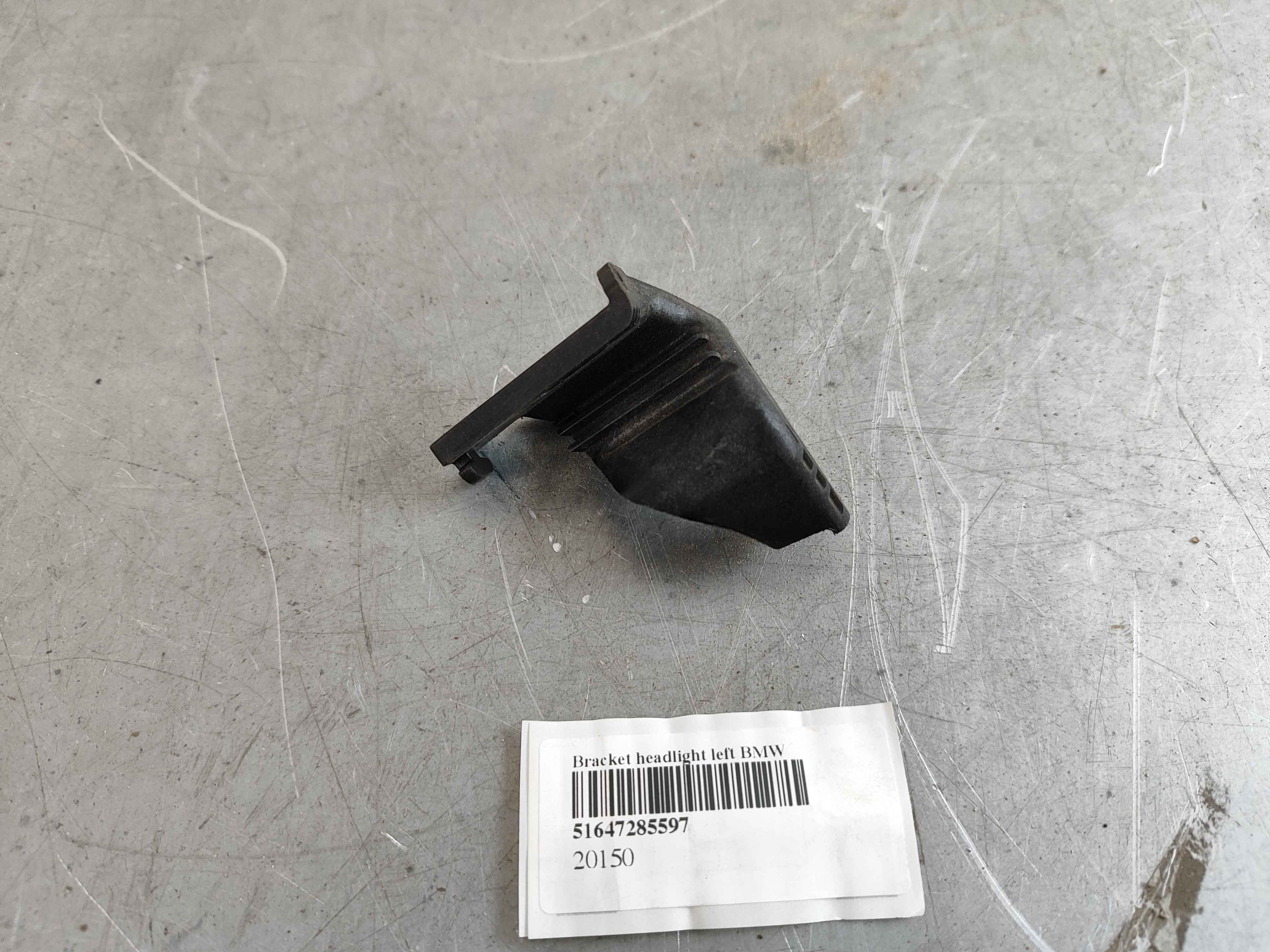 Bracket headlight left BMW