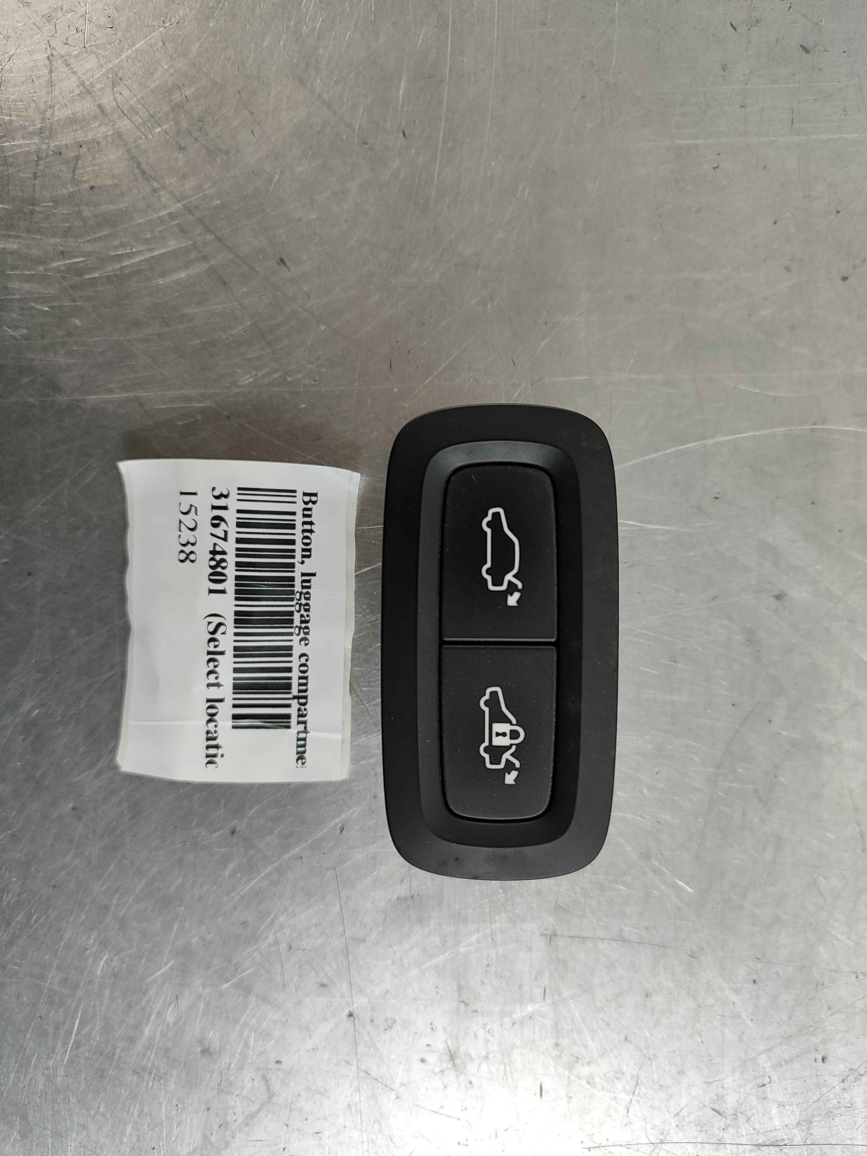 Button, luggage compartment