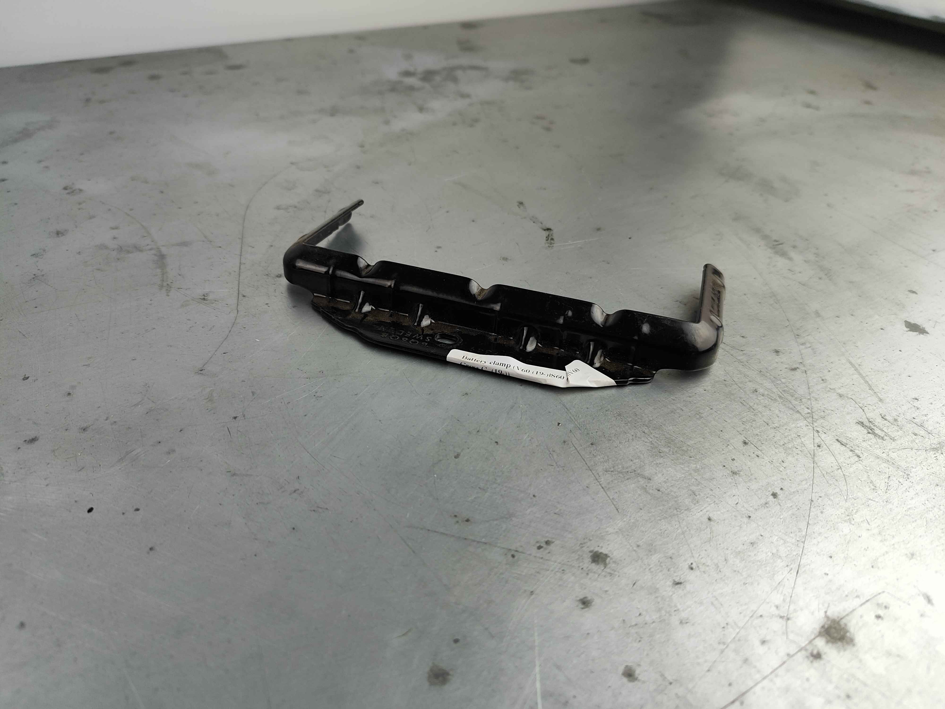 Battery clamp (V60 (19-)|S60 (19-)|V60 Cross C. (19-))