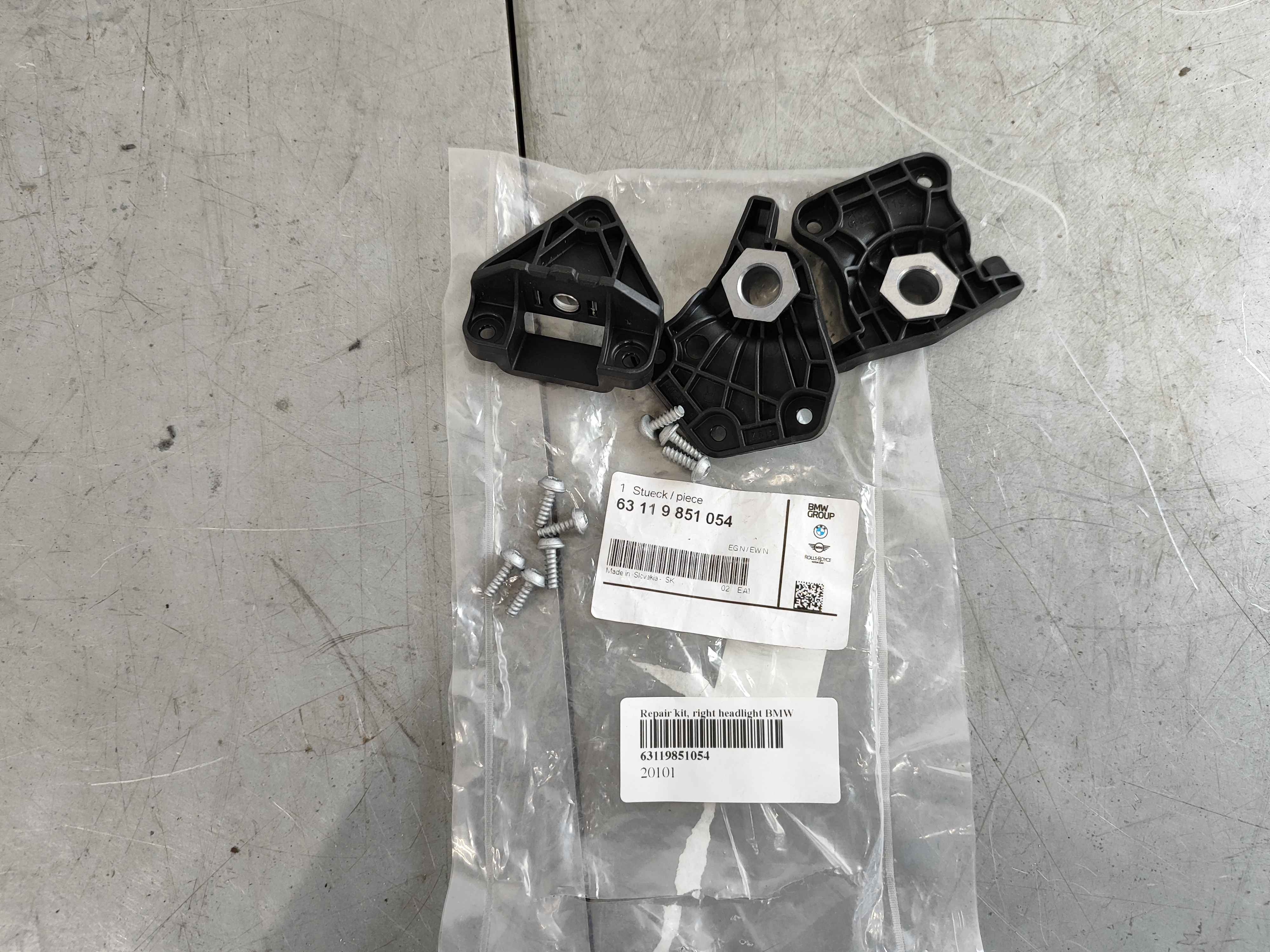 Repair kit, right headlight BMW