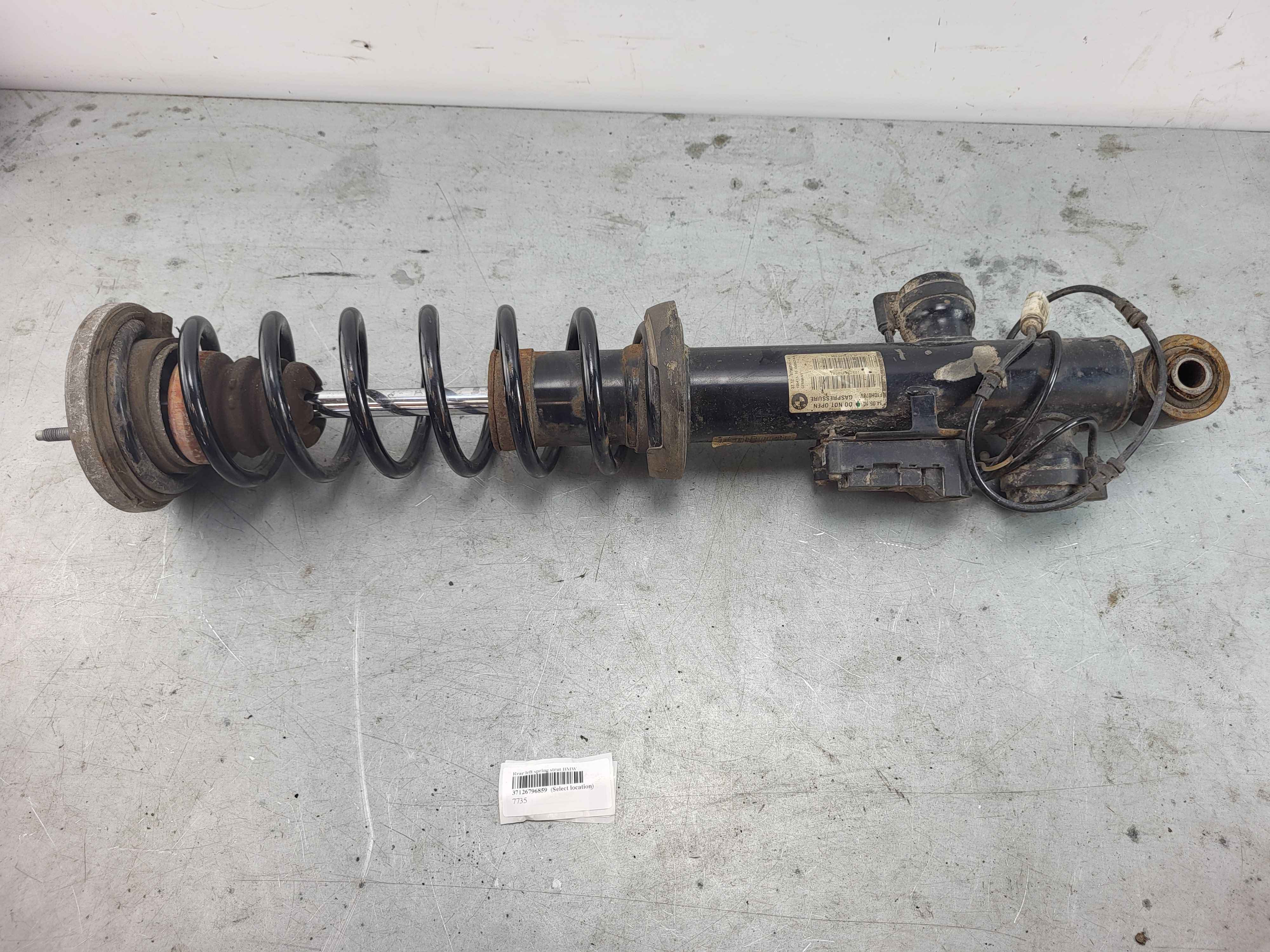 Rear left spring strut BMW