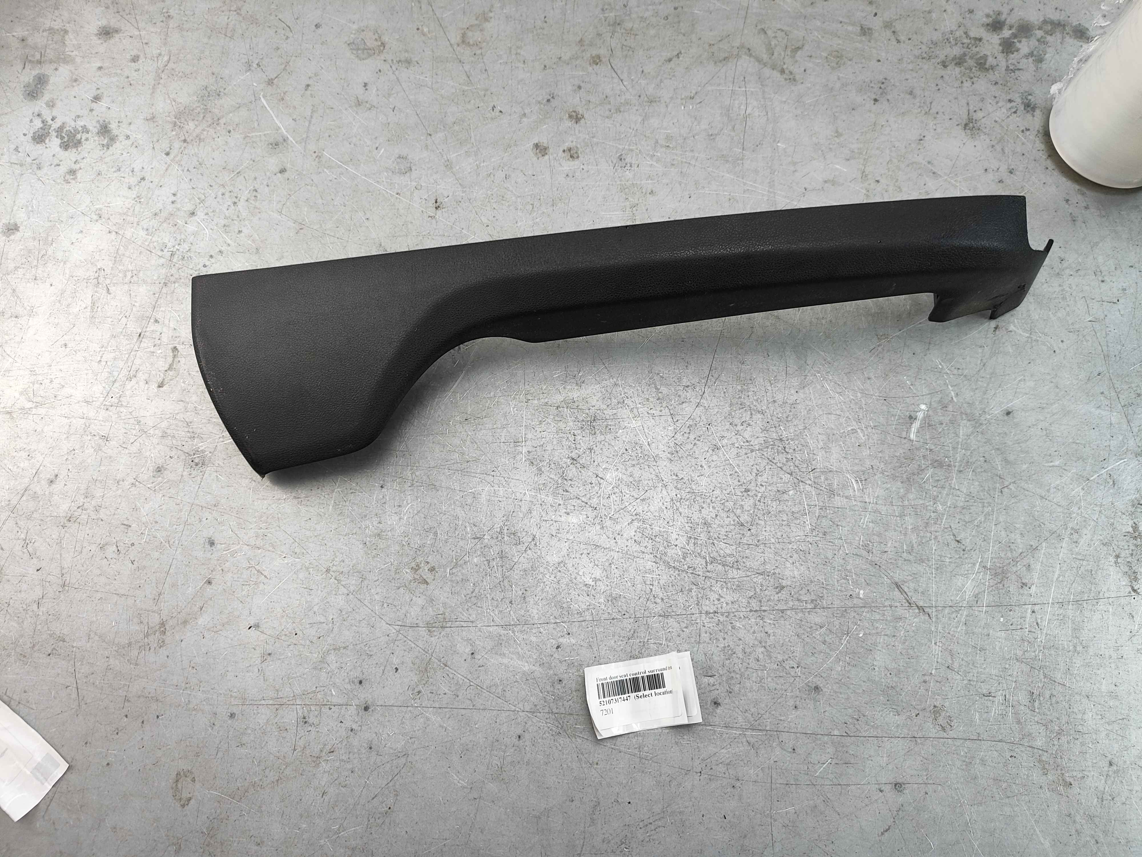 Front door seat control surround trim