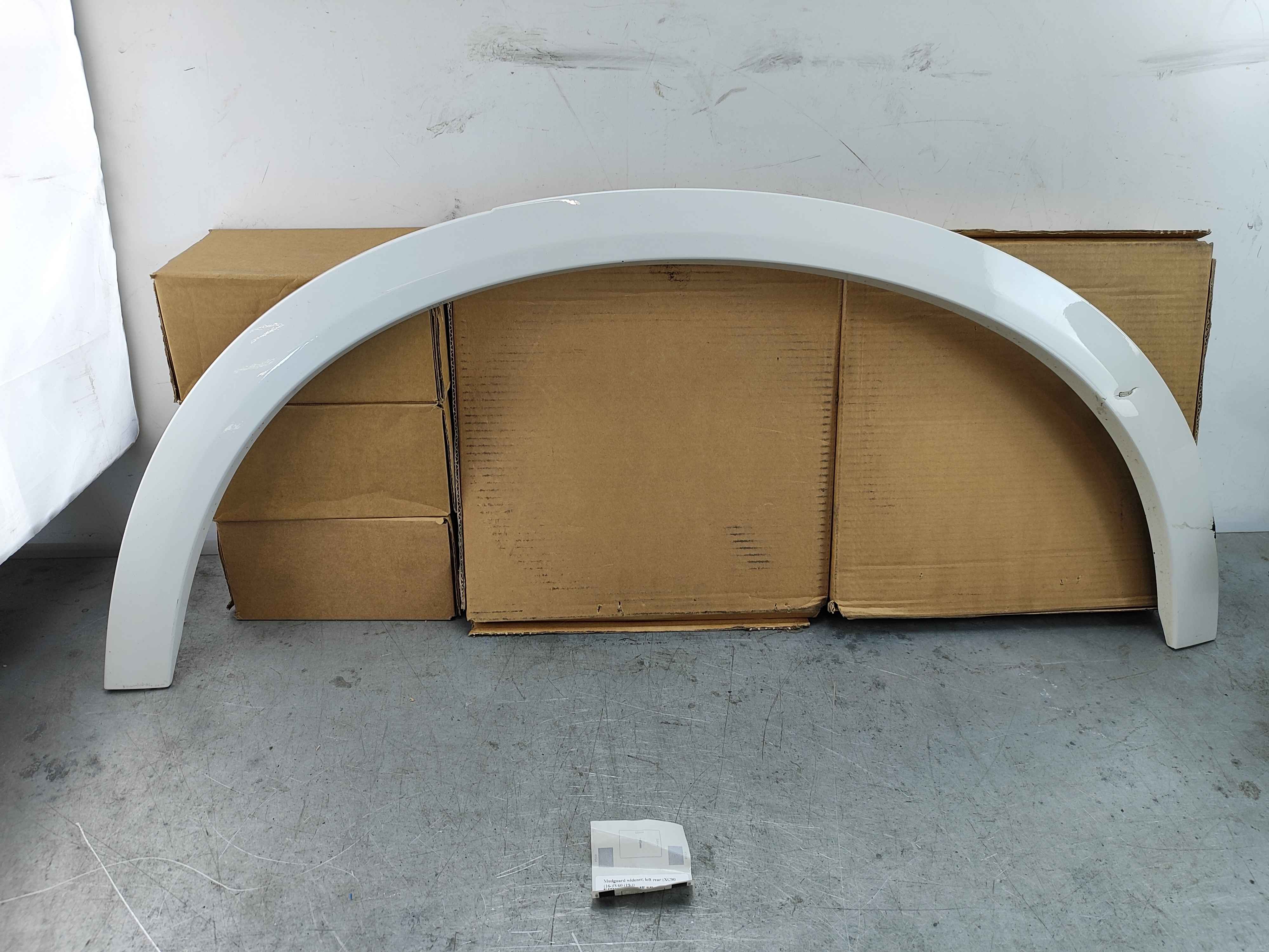 Mudguard widener, left rear (XC90 (16-)|V60 (19-))