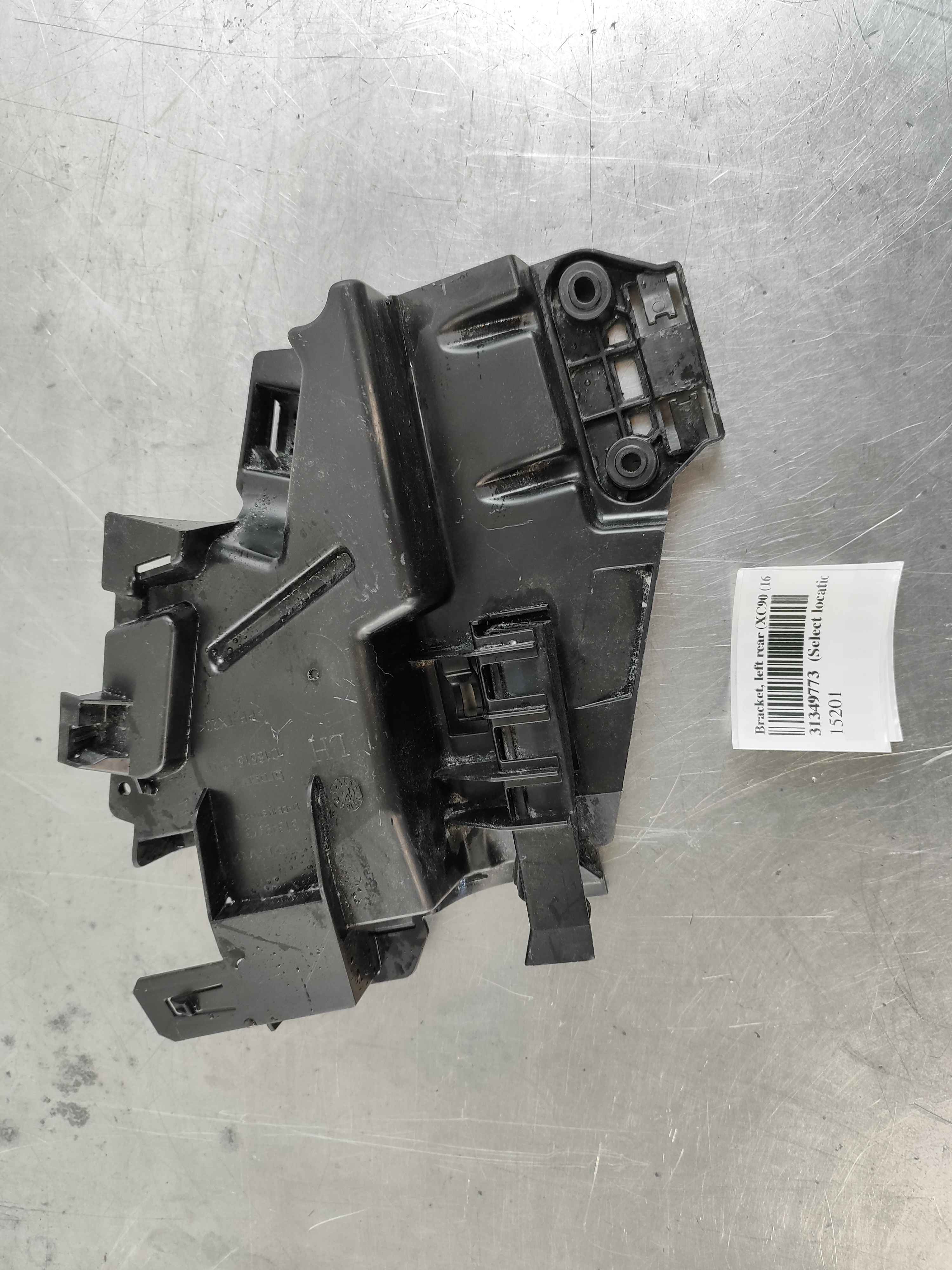 Bracket, left rear (XC90 (16-))