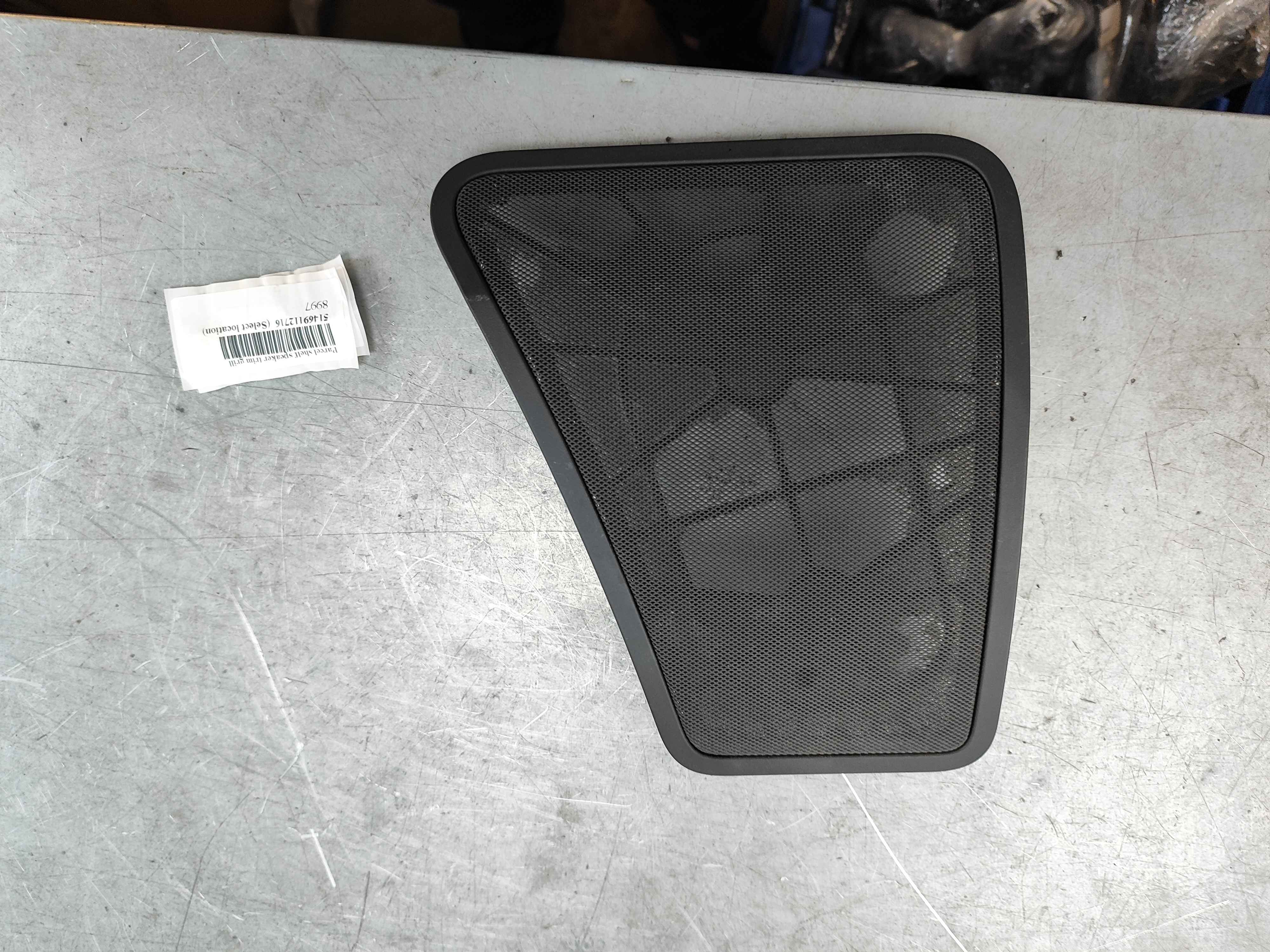 Parcel shelf speaker trim grill