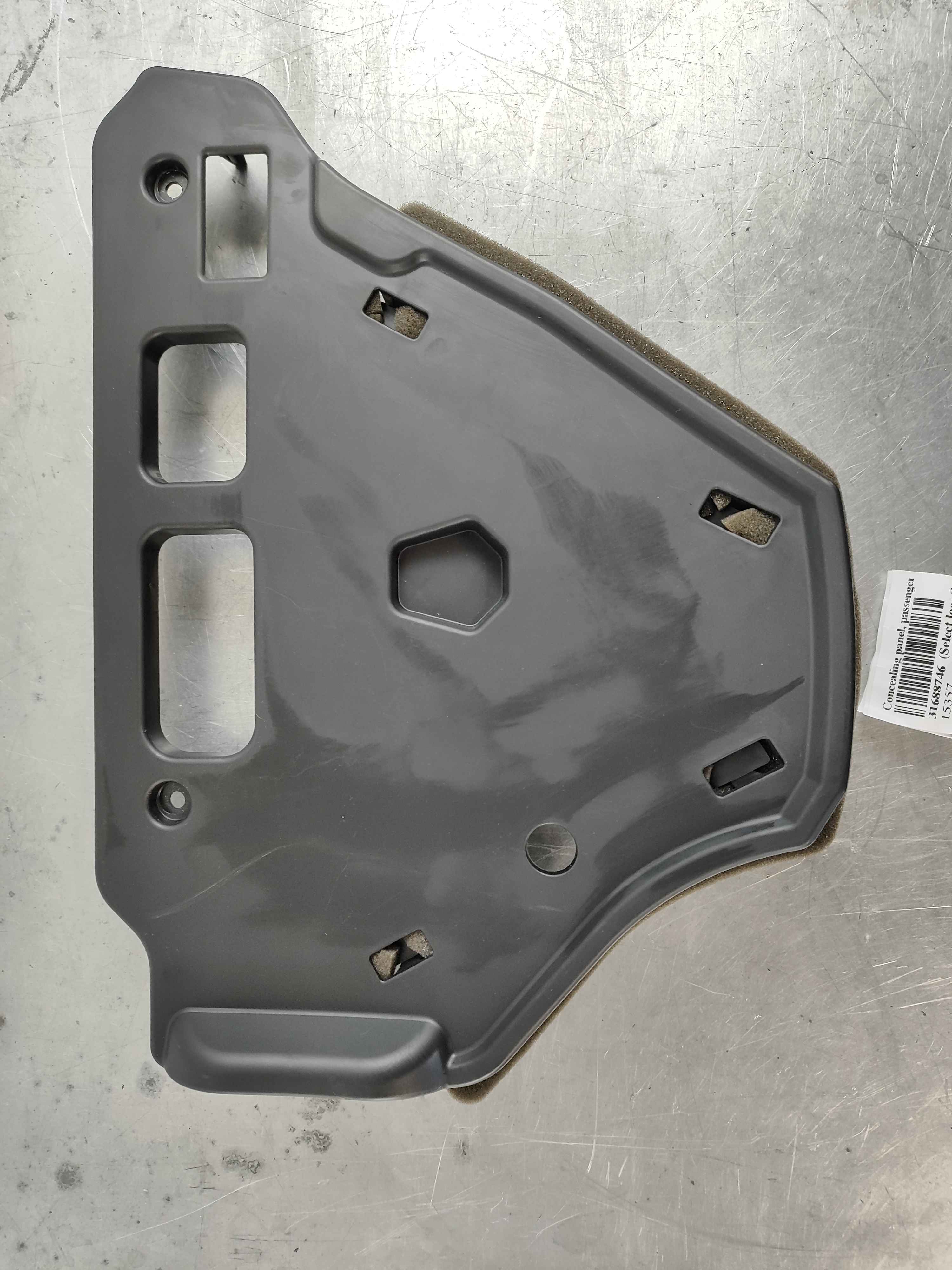 Concealing panel, passenger side