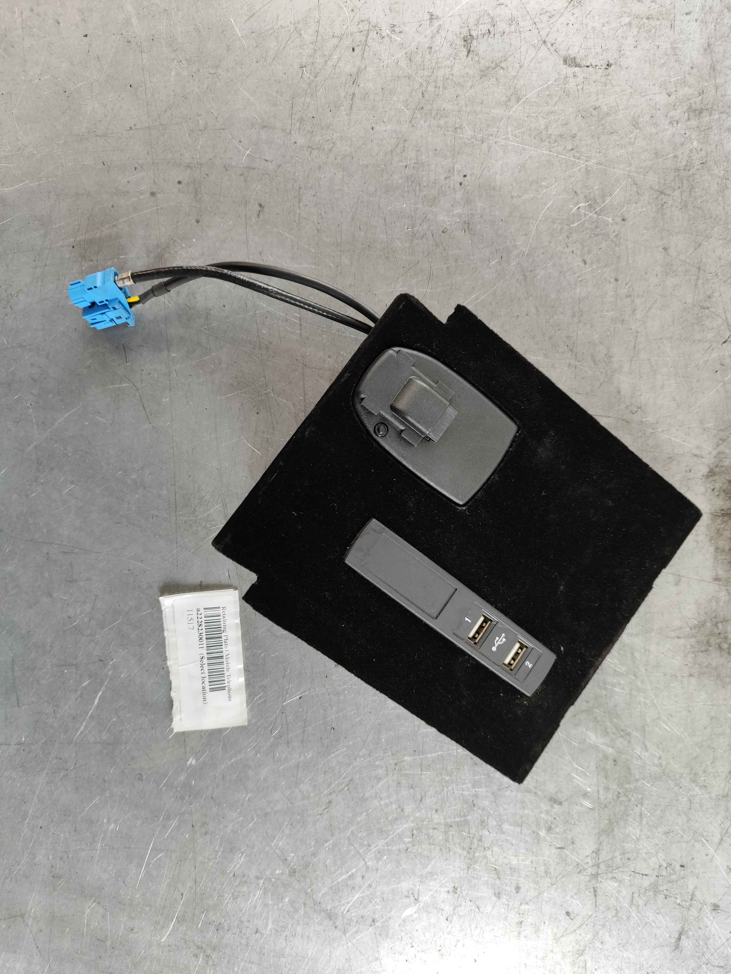 Retaining Plate | Mobile Telephone