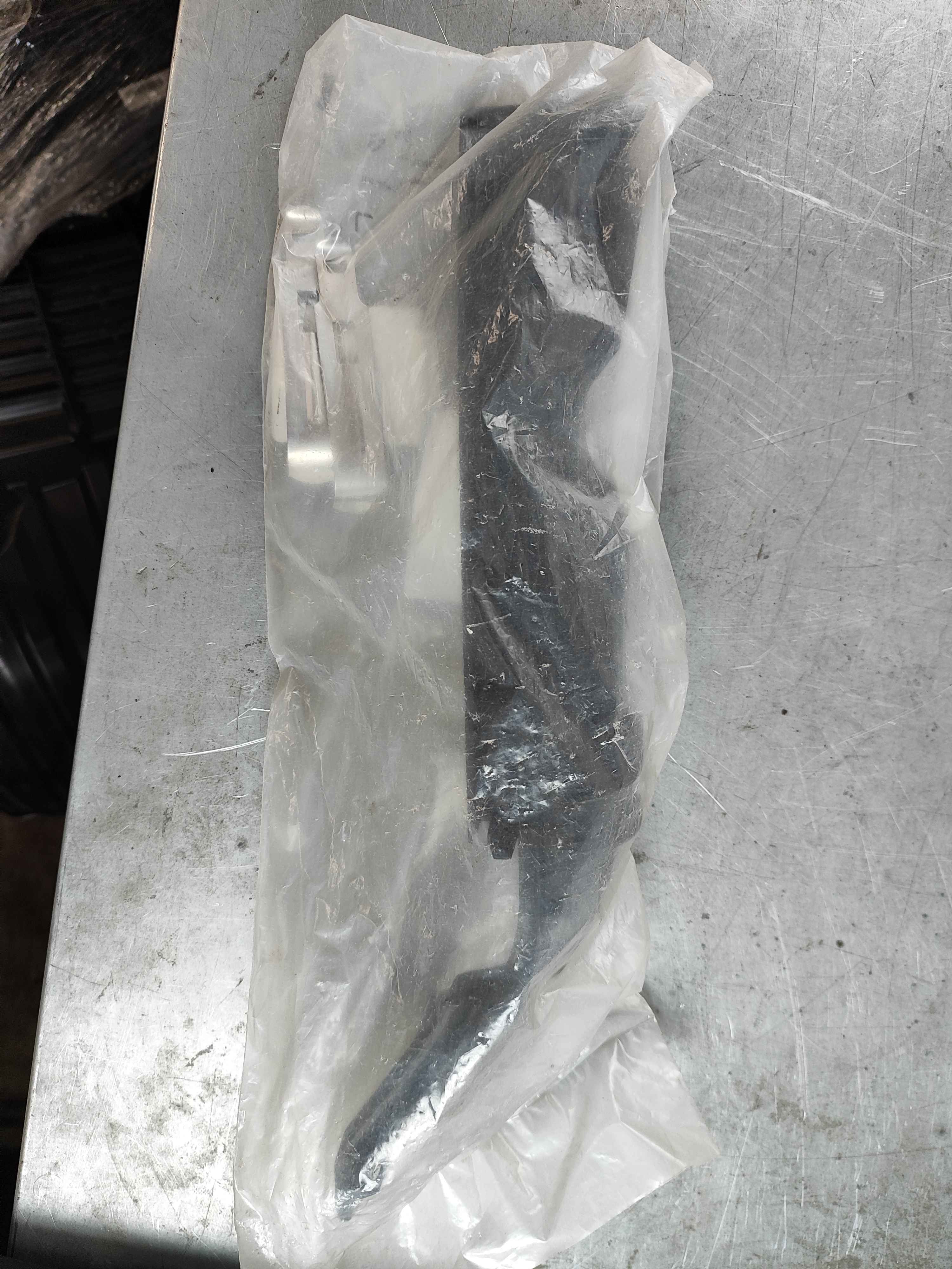 Bracket, left (XC60 (18-))