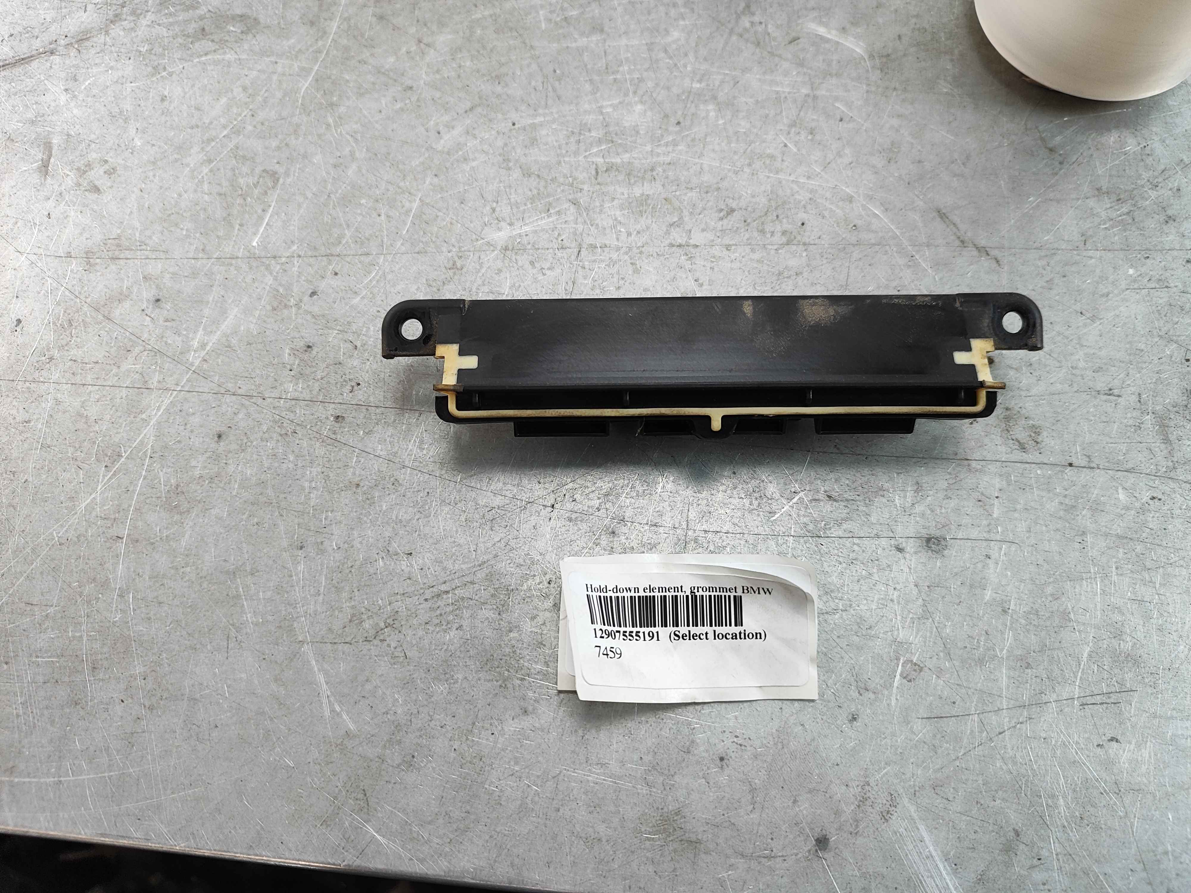 Hold-down element, grommet BMW