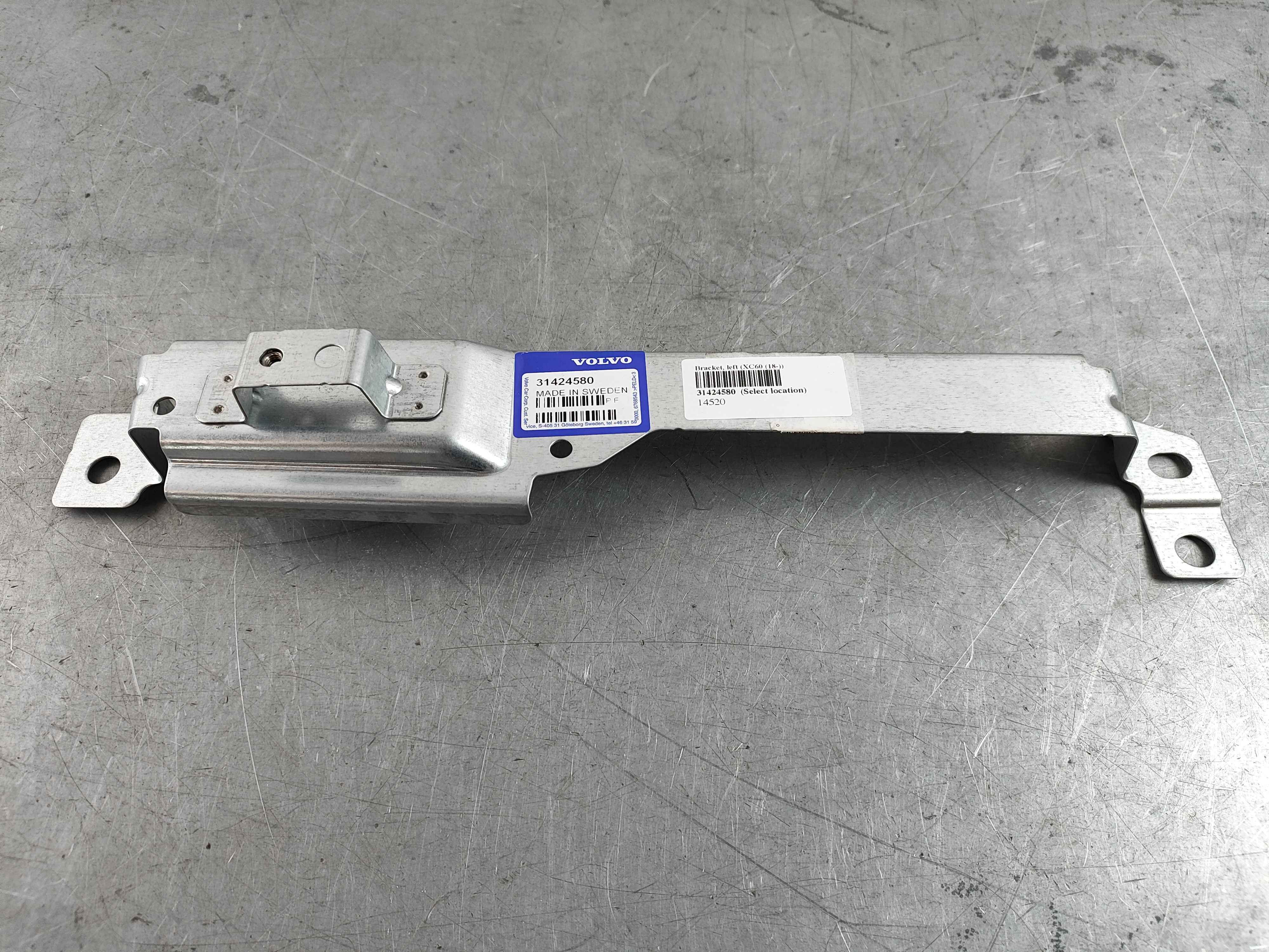 Bracket, left (XC60 (18-))