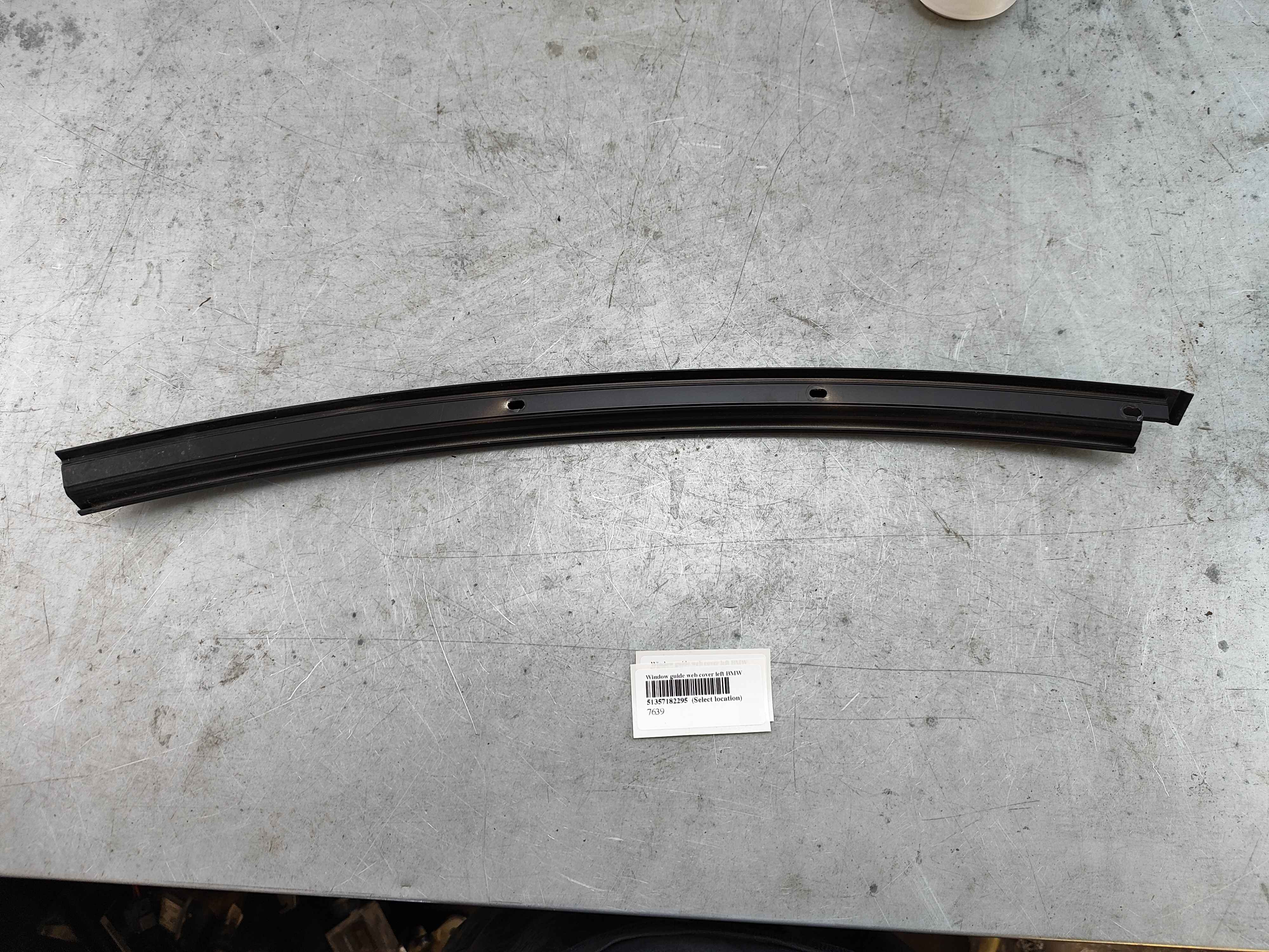 Window guide web cover left BMW