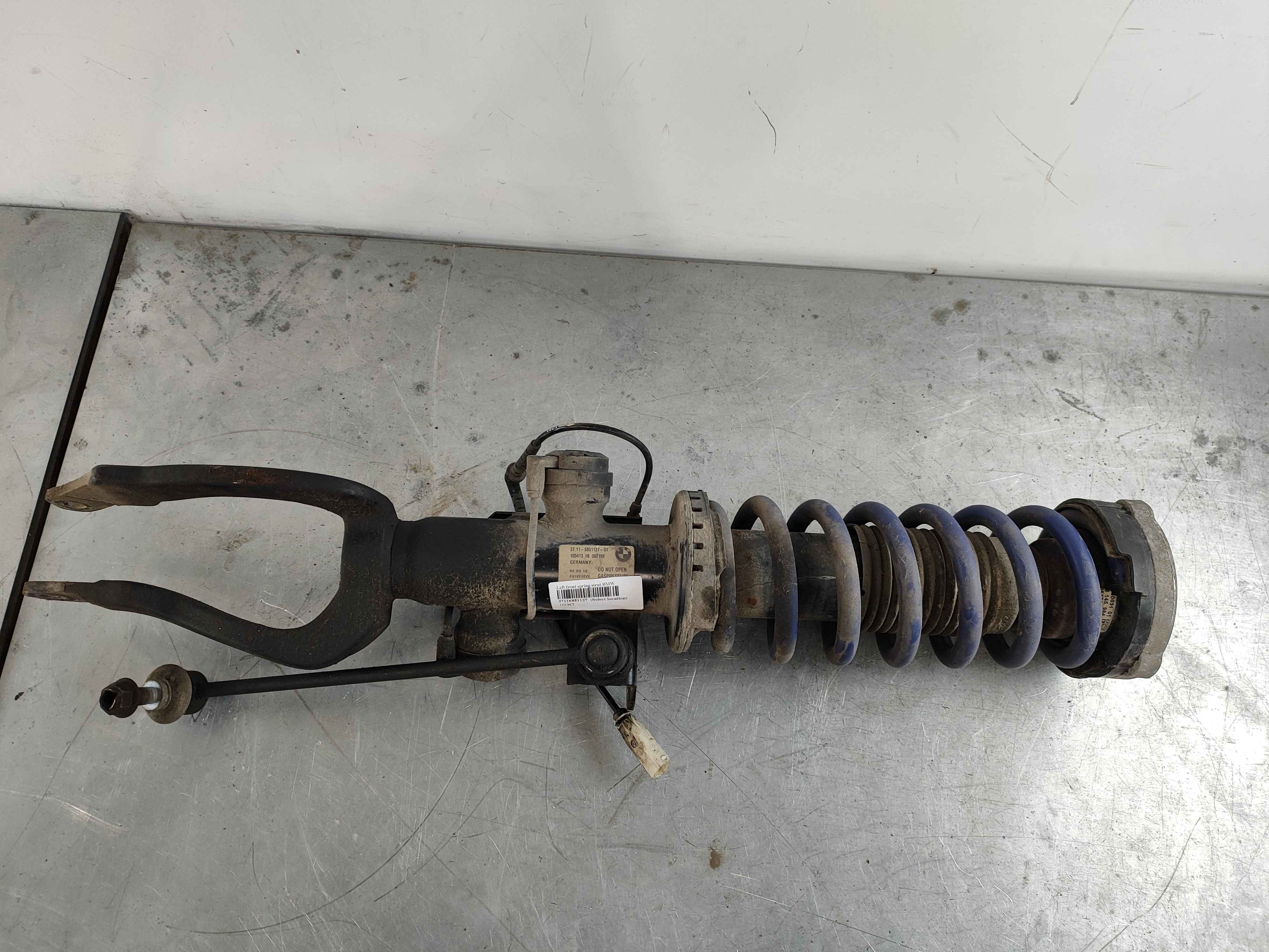 Left front spring strut BMW