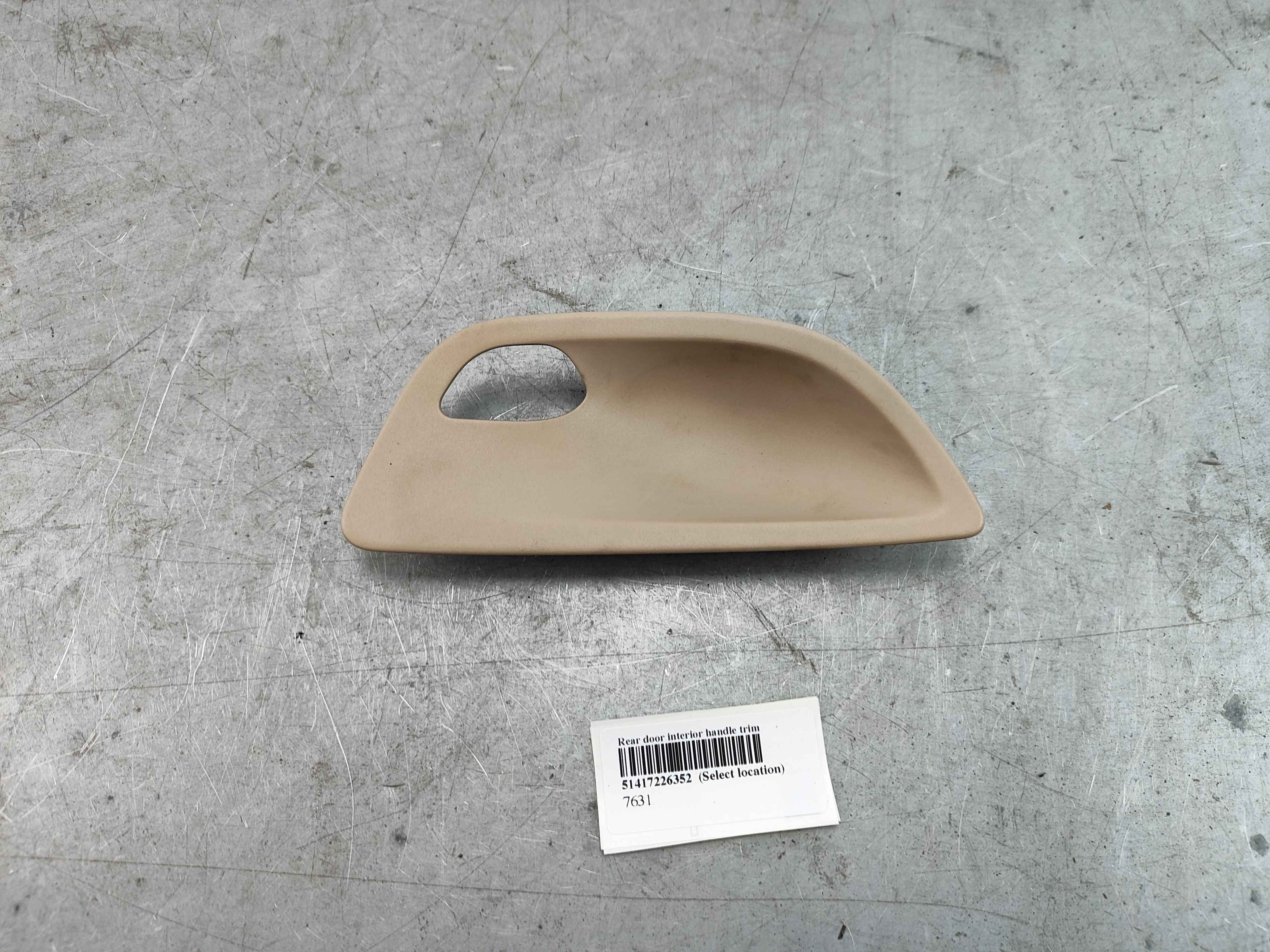Rear door interior handle trim