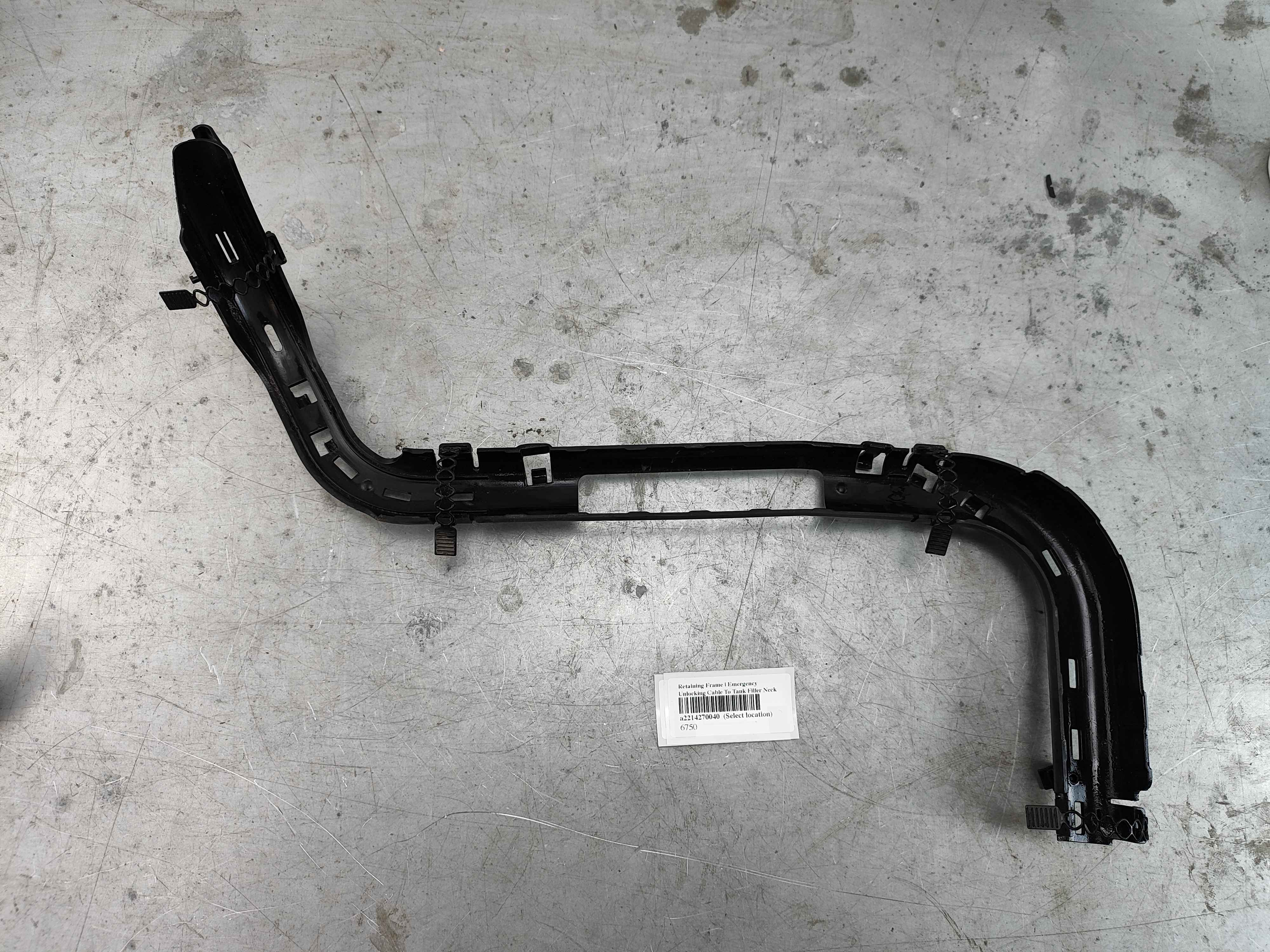 Retaining Frame | Emergency Unlocking Cable To Tank Filler Neck