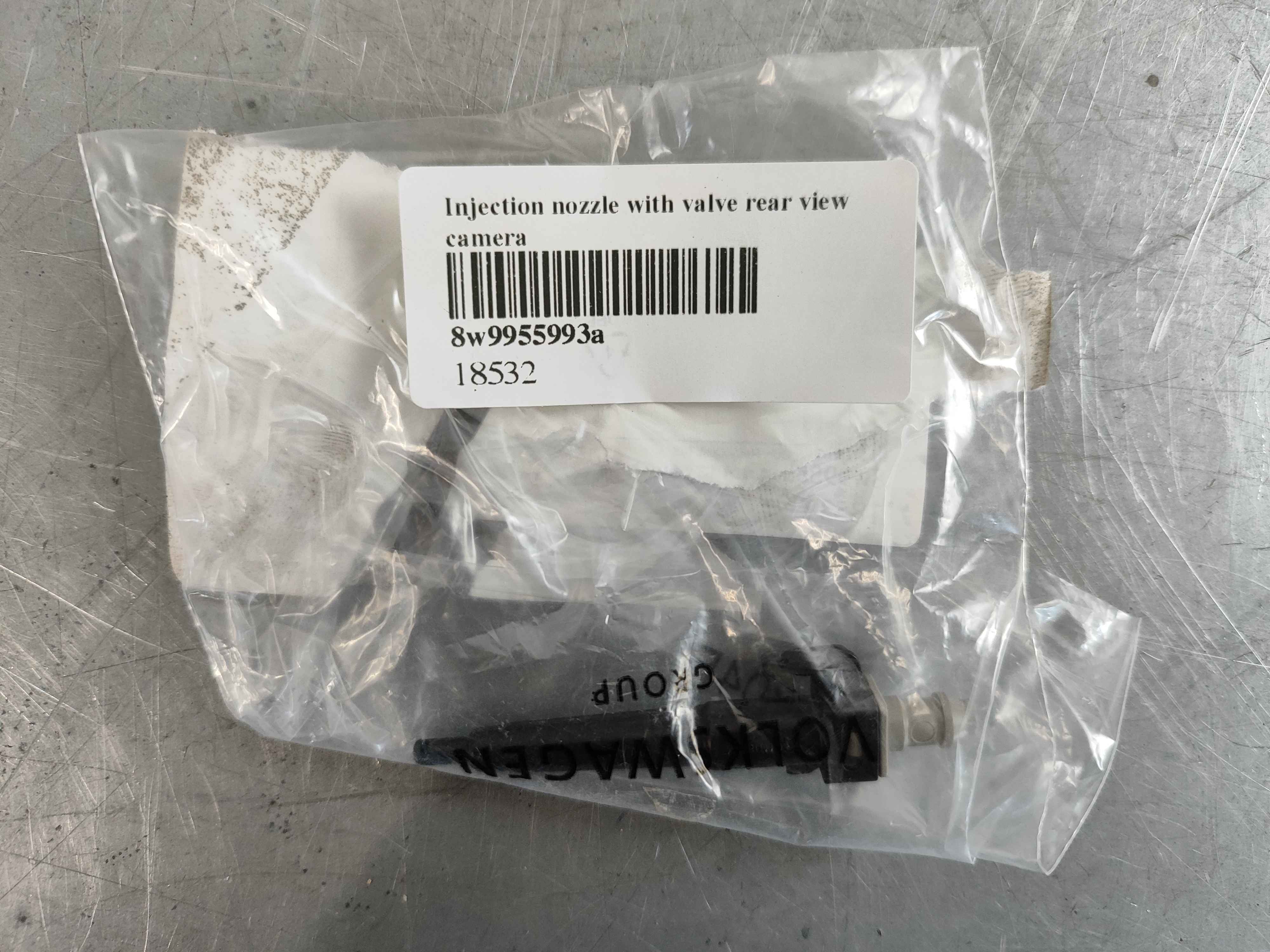 Injection nozzle with valve rear view camera