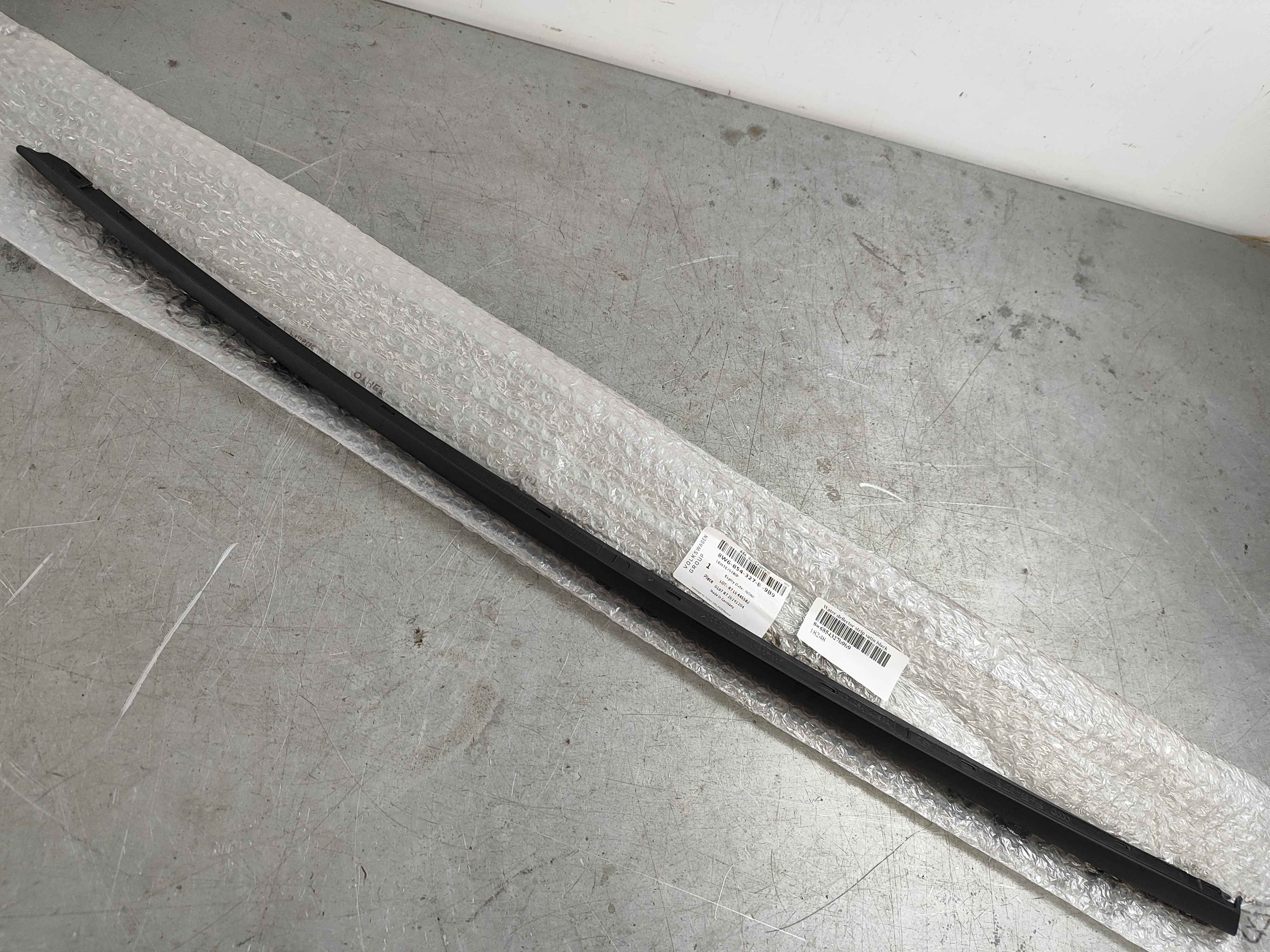 Water deflector strip satin black