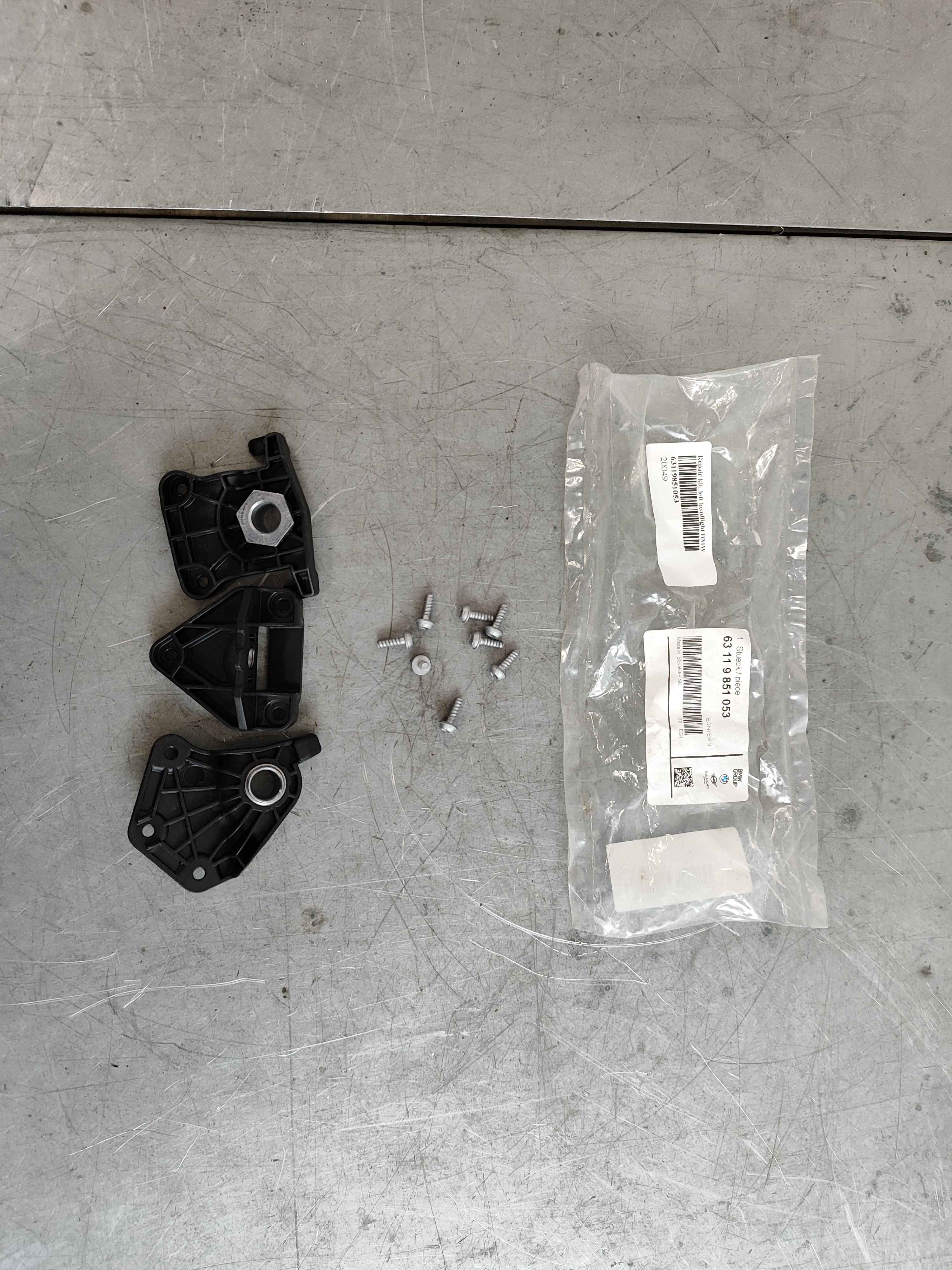 Repair kit, left headlight BMW