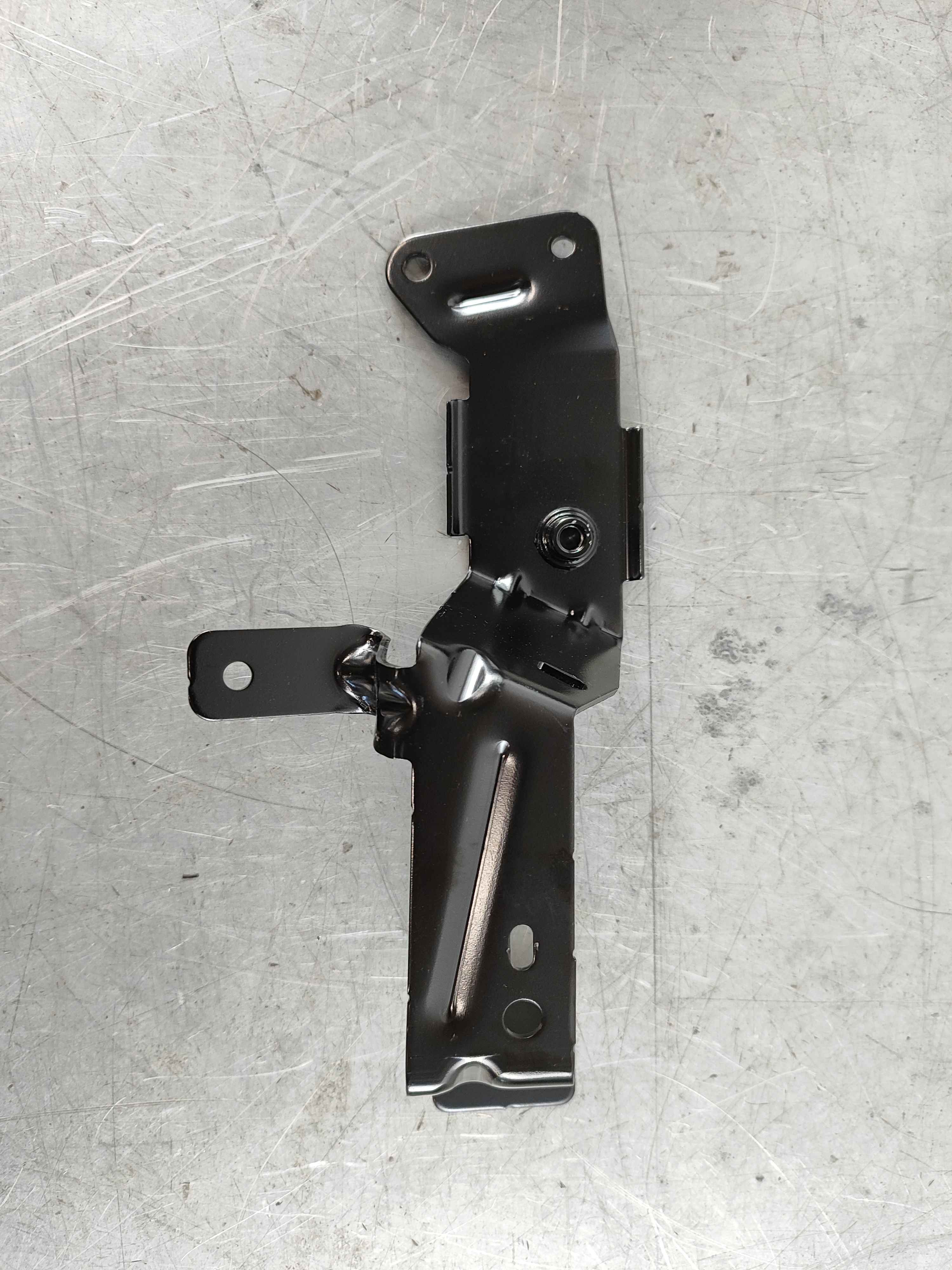 Bracket, left (XC60 (18-))