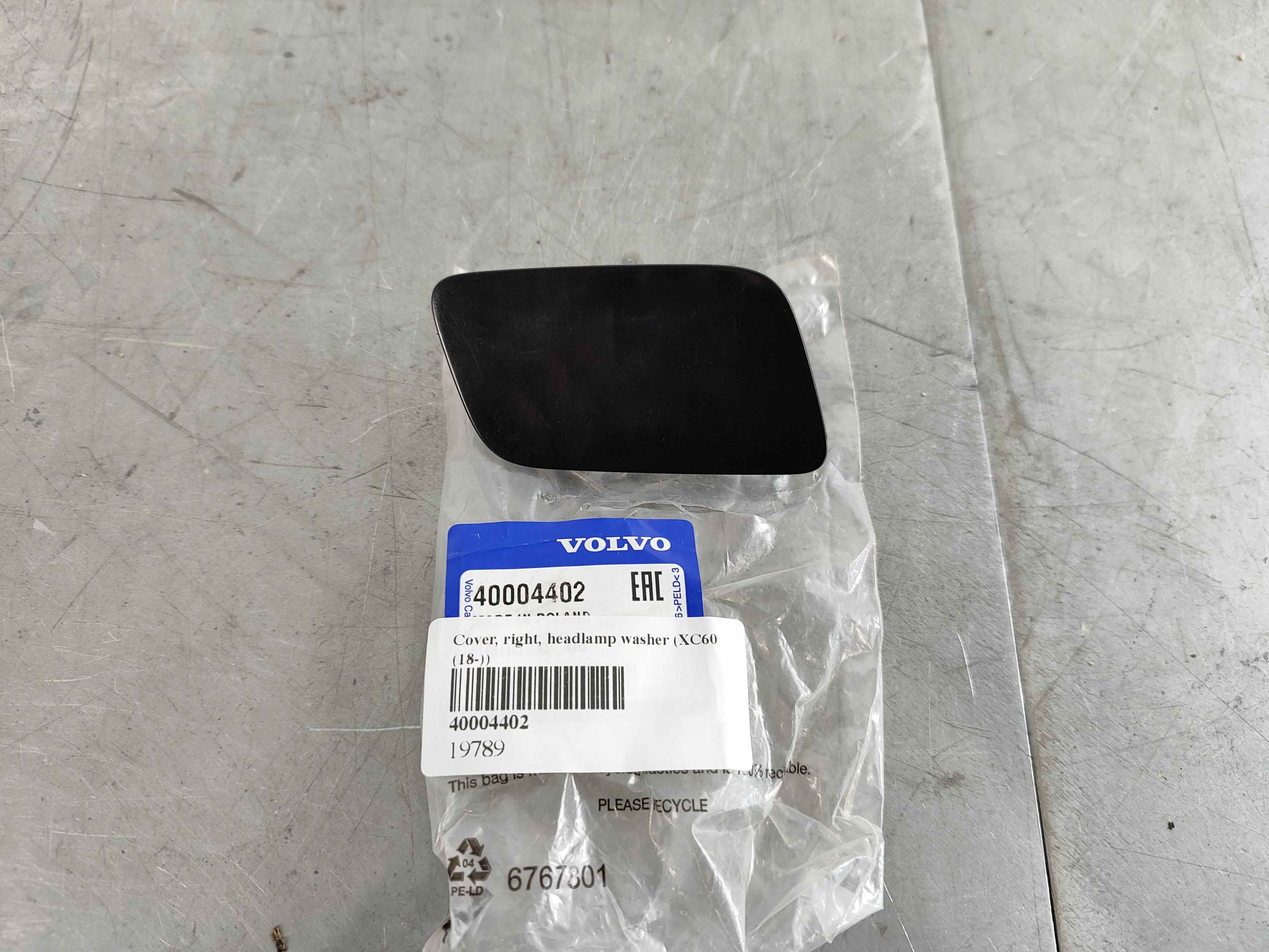 Cover, right, headlamp washer (XC60 (18-))